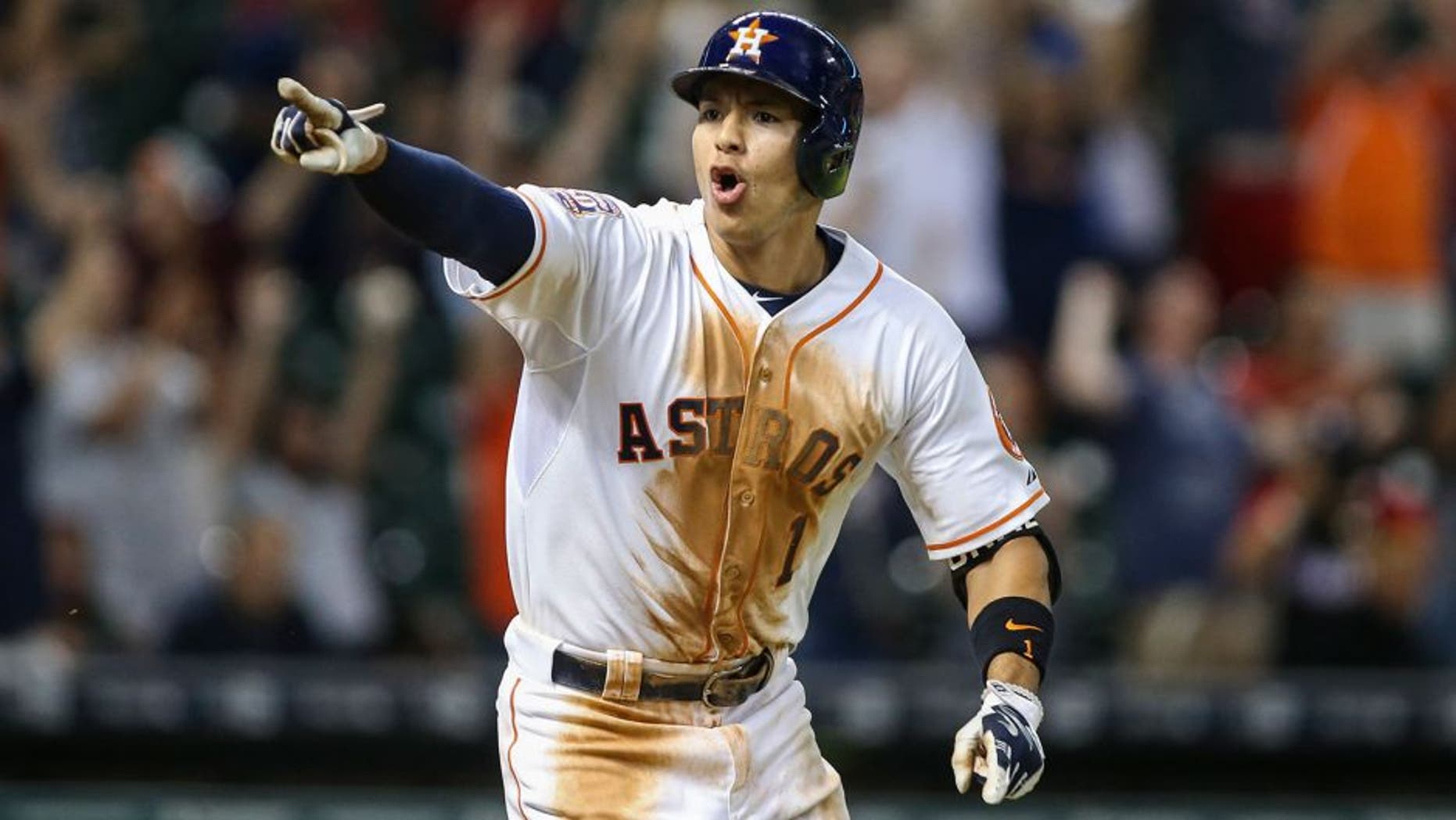 Aug 19, 2015; Houston, TX, USA; Houston Astros shortstop Carlos Correa (1) gets a walk off game-winning RBI single during the thirteenth inning as the Astros defeated the Tampa Bay Rays 3-2 at Minute Maid Park. Mandatory Credit: Troy Taormina-USA TODAY Sports