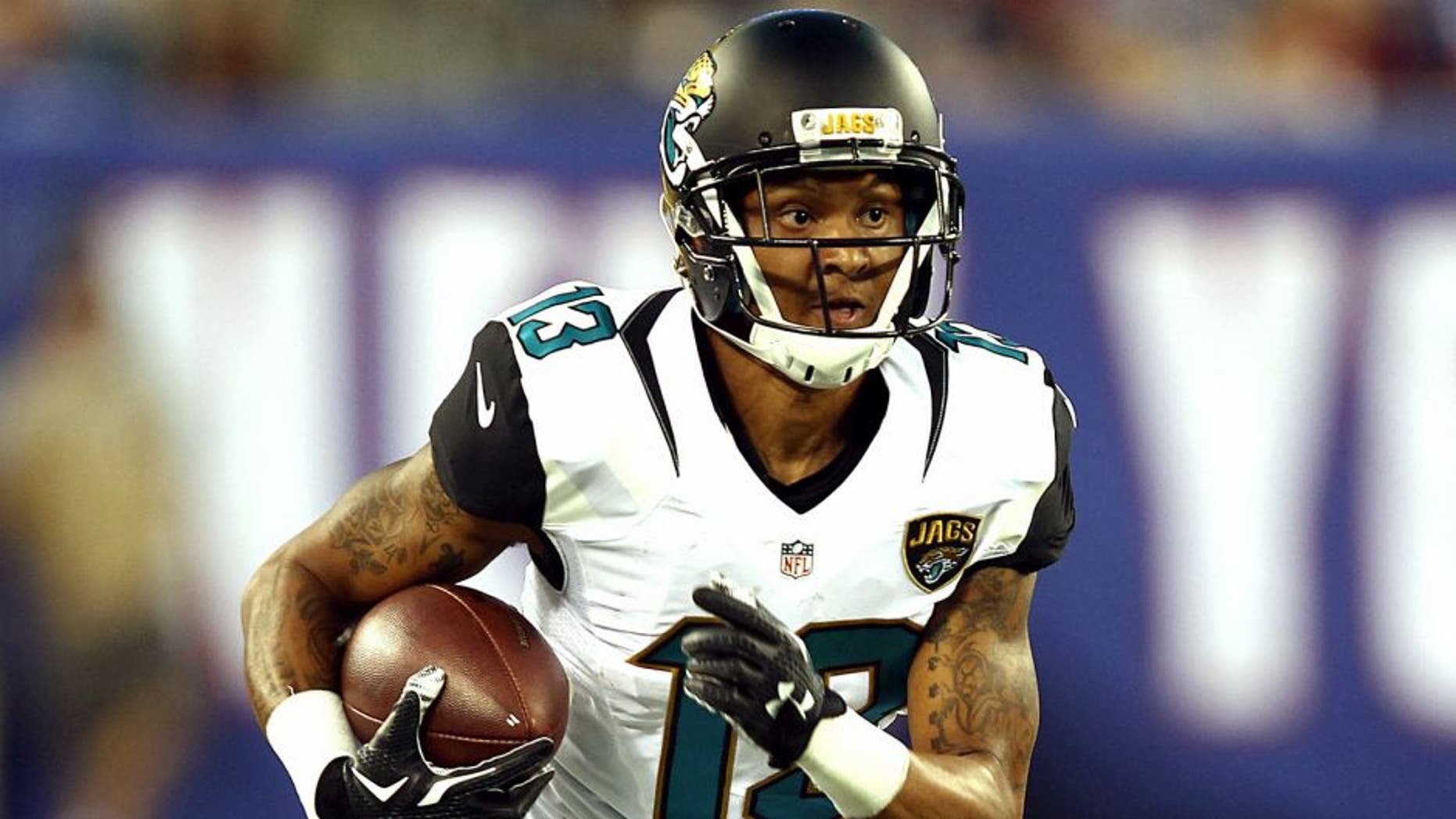 Aug 22, 2015; East Rutherford, NJ, USA; Jacksonville Jaguars wide receiver Rashad Greene (13) runs after a catch during the first half at MetLife Stadium. Mandatory Credit: Danny Wild-USA TODAY Sports