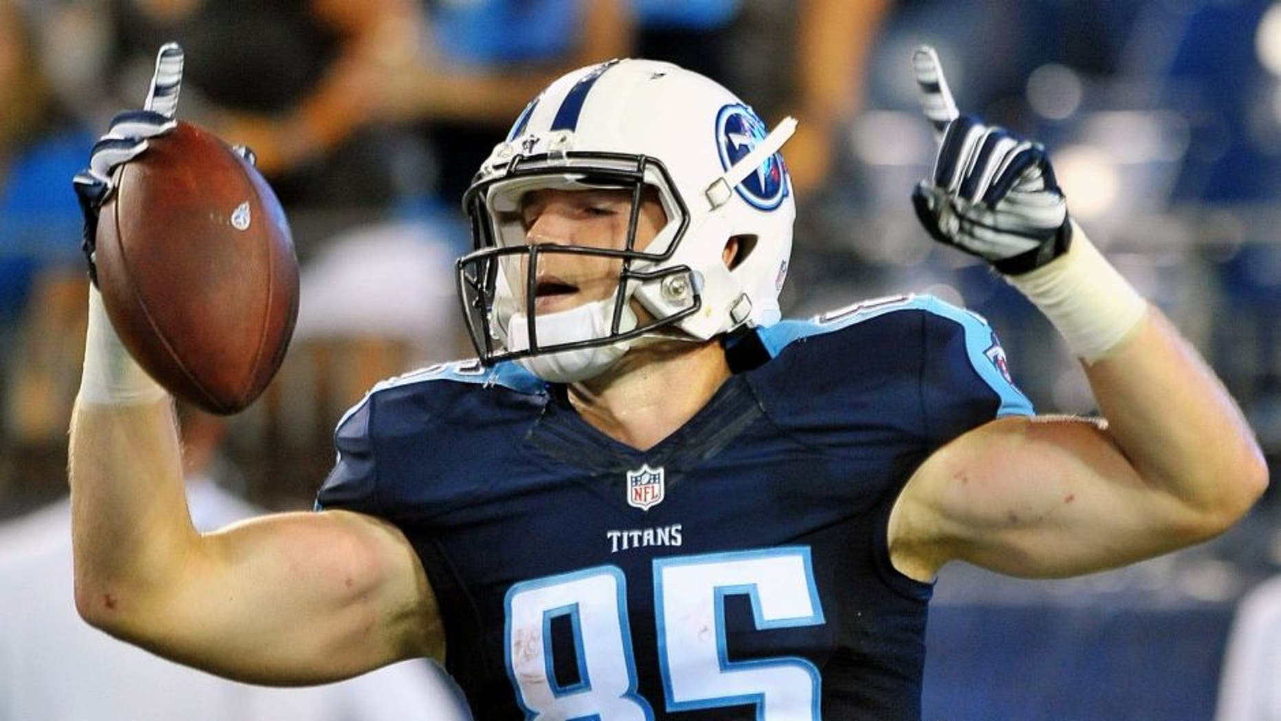Aug 23, 2015; Nashville, TN, USA; Tennessee Titans tight end Chase Coffman (85) celebrates scoring a touchdown after catching a pass from Titans quarterback Alex Tanney (not pictured) during the second half at Nissan Stadium. Titans won 27-14. Mandatory Credit: Jim Brown-USA TODAY Sports