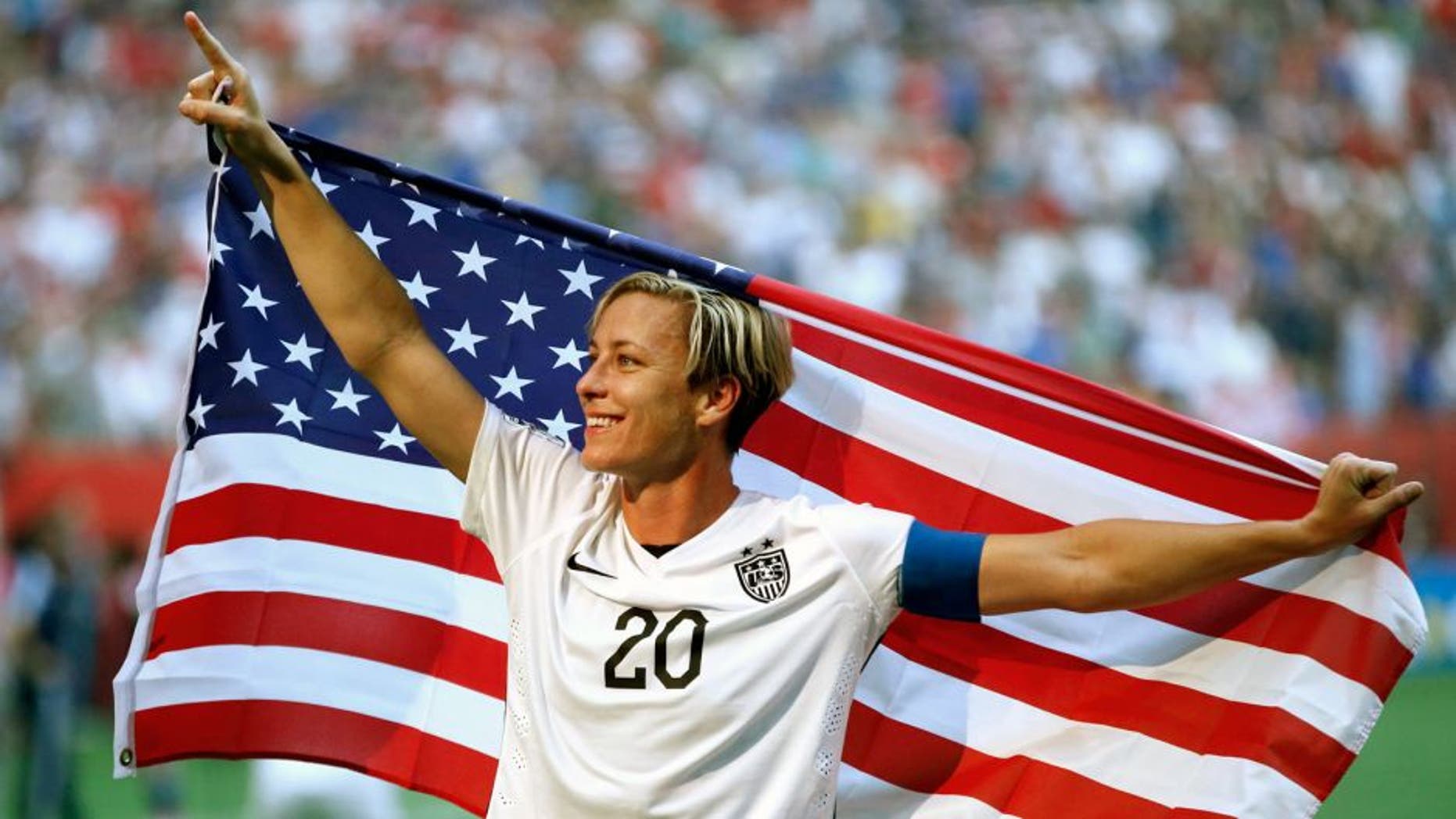 Jul 5, 2015; Vancouver, British Columbia, CAN; United States forward Abby Wambach (20) celebrates after defeating Japan in the final of the FIFA 2015 Women's World Cup at BC Place Stadium. United States won 5-2. Mandatory Credit: Michael Chow-USA TODAY Sports