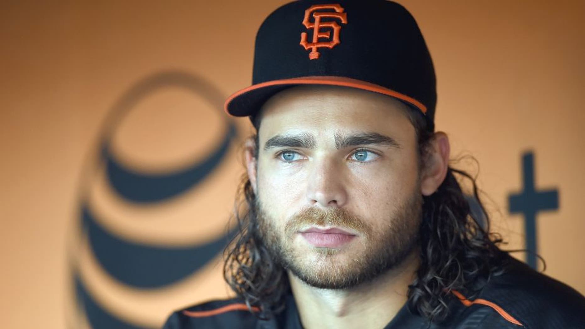 SAN FRANCISCO, CA - AUGUST 25: Brandon Crawford #35 of the San Francisco Giants looks on from the dugout during batting practice prior to playing the Chicago Cubs at AT&T Park on August 25, 2015 in San Francisco, California. (Photo by Thearon W. Henderson/Getty Images)