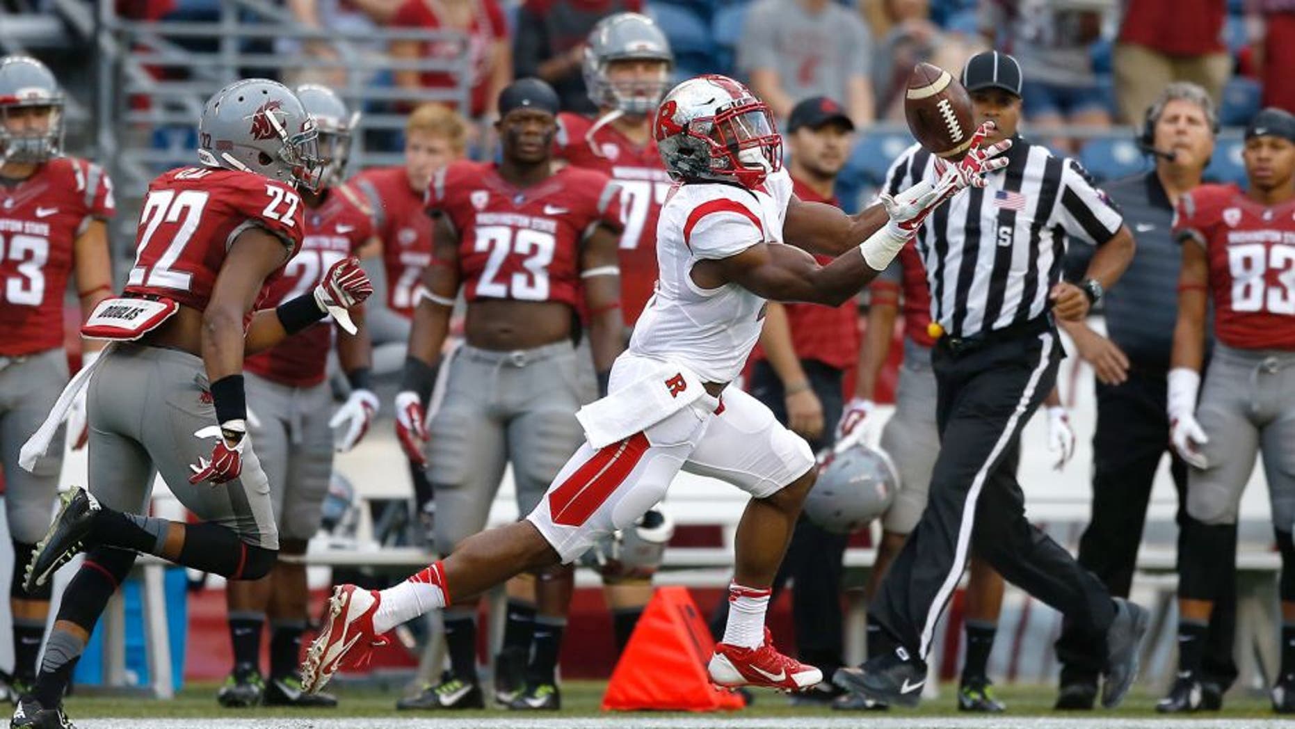 SEATTLE, WA - AUGUST 28: Wide receiver Leonte Carroo #4 of the Rutgers Scarlet Knights makes a touchdown catch on the first play of the game against the Washington State Cougars at CenturyLink Field on August 28, 2014 in Seattle, Washington. (Photo by Otto Greule Jr/Getty Images)