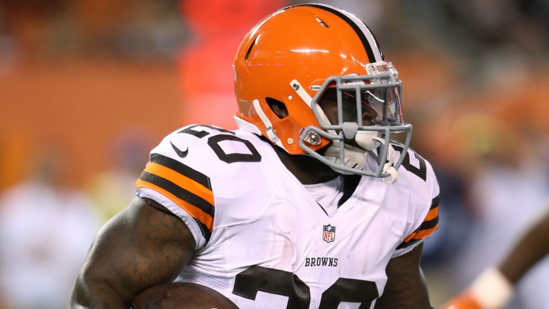 Aug 28, 2014; Cleveland, OH, USA; Cleveland Browns running back Terrance West (20) runs against Chicago Bears during the second quarter at FirstEnergy Stadium. Mandatory Credit: Ron Schwane-USA TODAY Sports