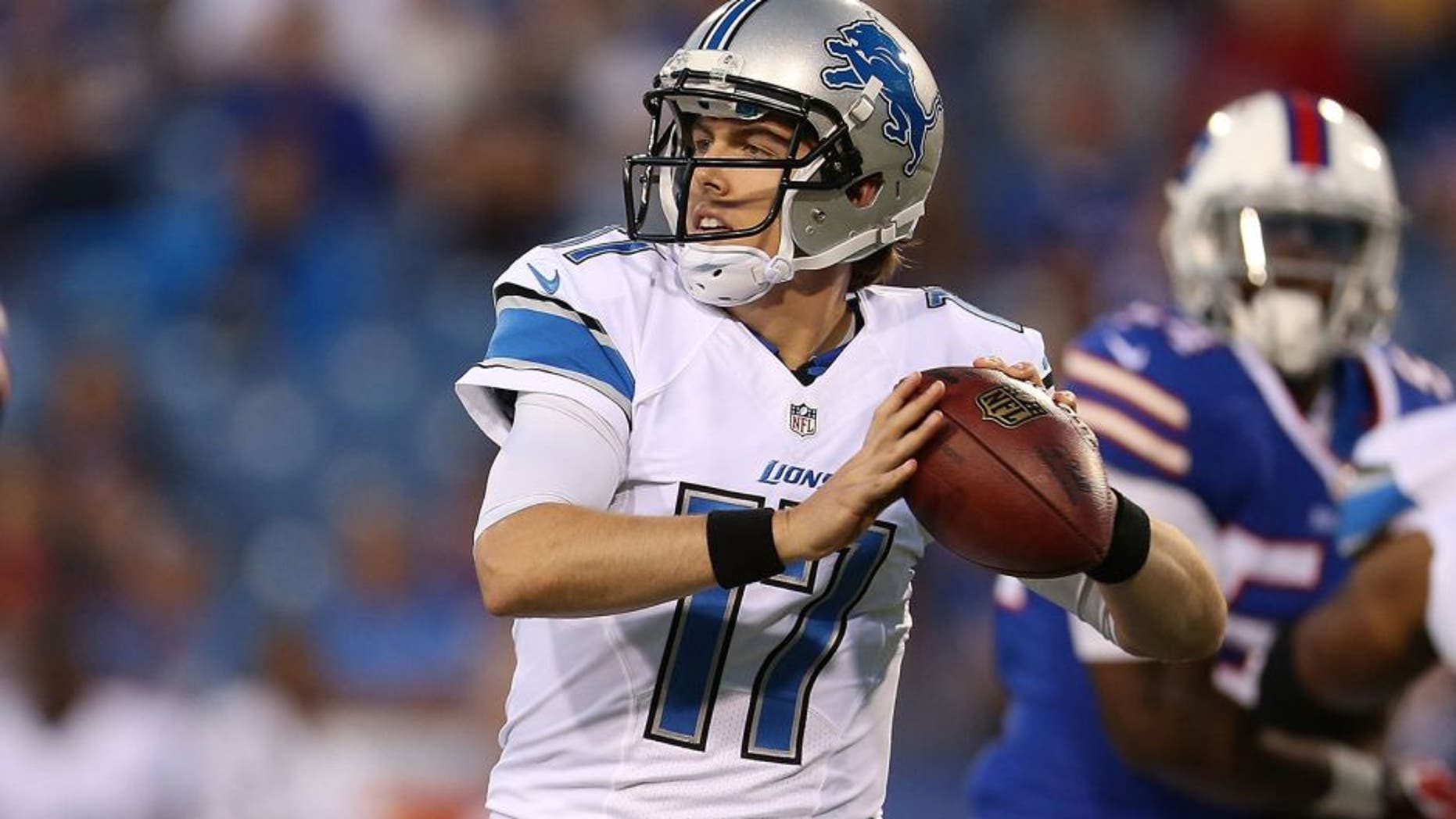 ORCHARD PARK, NY - AUGUST 28: Kellen Moore #17 of the Detroit Lions throws during the first half of a preseason game against the Buffalo Bills at Ralph Wilson Stadium on August 28, 2014 in Orchard Park, New York. (Photo by Vaughn Ridley/Getty Images)