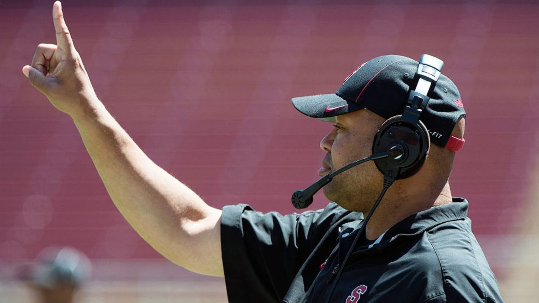 April 12, 2014; Stanford, CA, USA; Stanford Cardinal head coach David Shaw signals during the spring game at Stanford Stadium. Mandatory Credit: Kyle Terada-USA TODAY Sports