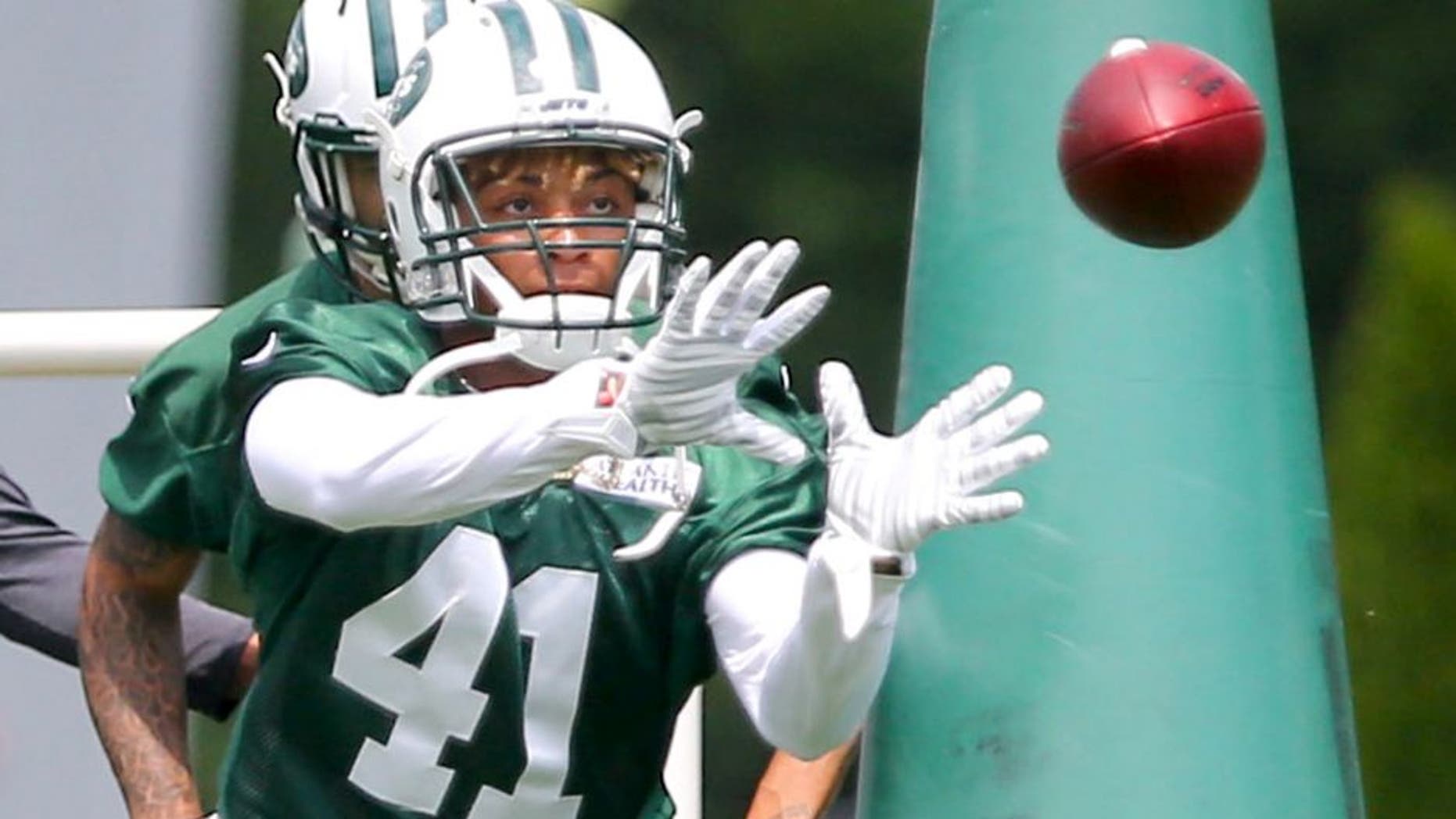 Jun 9, 2015; Florham Park, NJ, USA; New York Jets cornerback Buster Skrine (41) catches a pass during New York Jets minicamp at Atlantic Health Jets Training Center. Mandatory Credit: Ed Mulholland-USA TODAY Sports