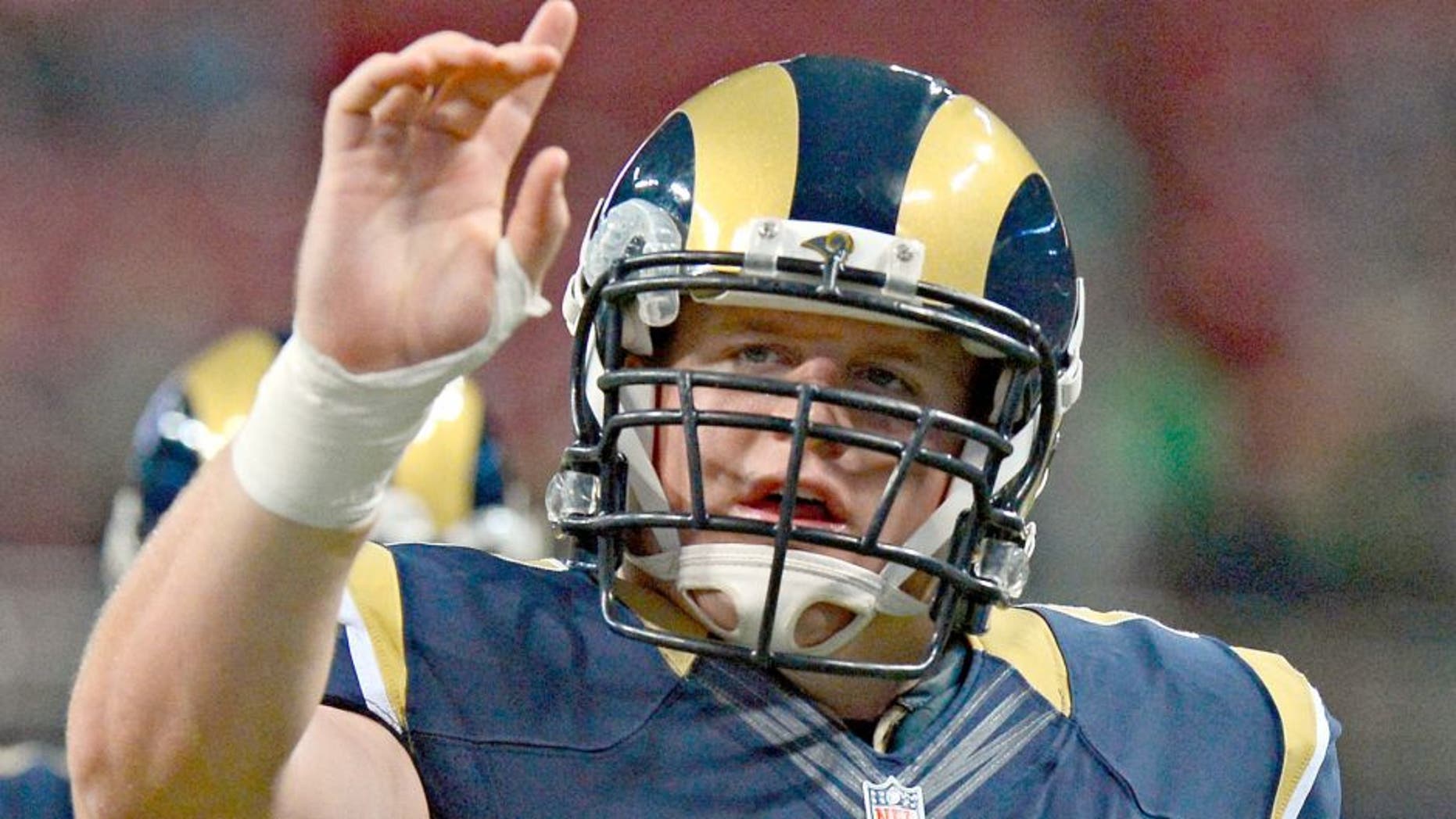 Oct 19, 2014; St. Louis, MO, USA; St. Louis Rams guard Barrett Jones (67) warms up before a game against the Seattle Seahawks at the Edward Jones Dome. St. Louis defeated Seattle 28-26. Mandatory Credit: Jeff Curry-USA TODAY Sports