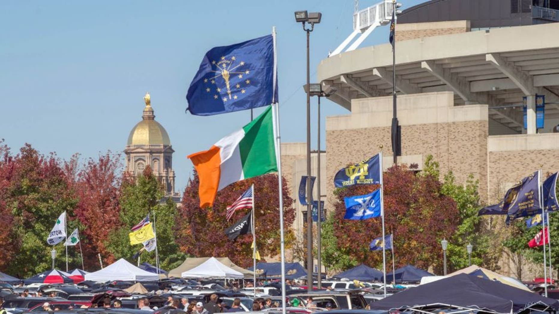 Oct 11, 2014; South Bend, IN, USA; A general view of the golden dome and the stadium at the University of Notre Dame before the game between the Notre Dame Fighting Irish and the North Carolina Tar Heels at Notre Dame Stadium. Mandatory Credit: Matt Cashore-USA TODAY Sports