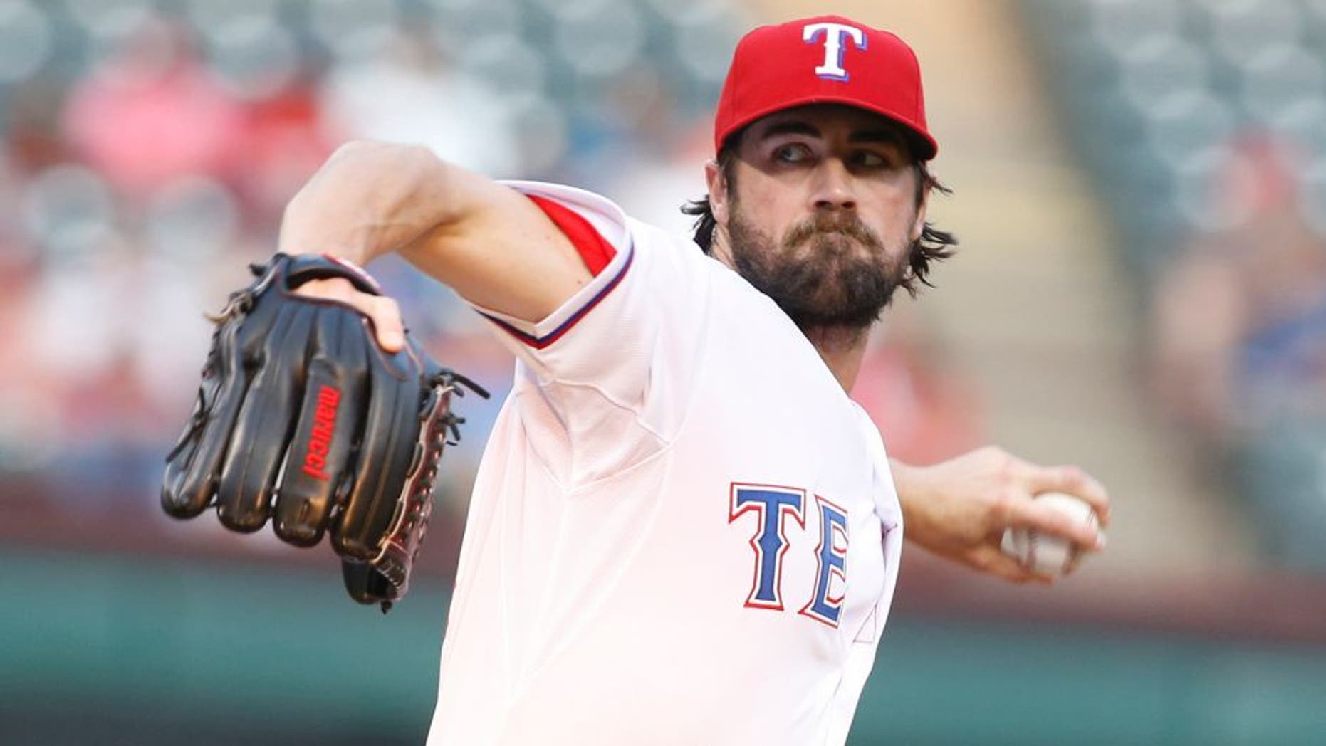 Aug 28, 2015; Arlington, TX, USA; Texas Rangers starting pitcher Cole Hamels (35) throws a pitch in the first inning at bat at Globe Life Park in Arlington. Mandatory Credit: Tim Heitman-USA TODAY Sports