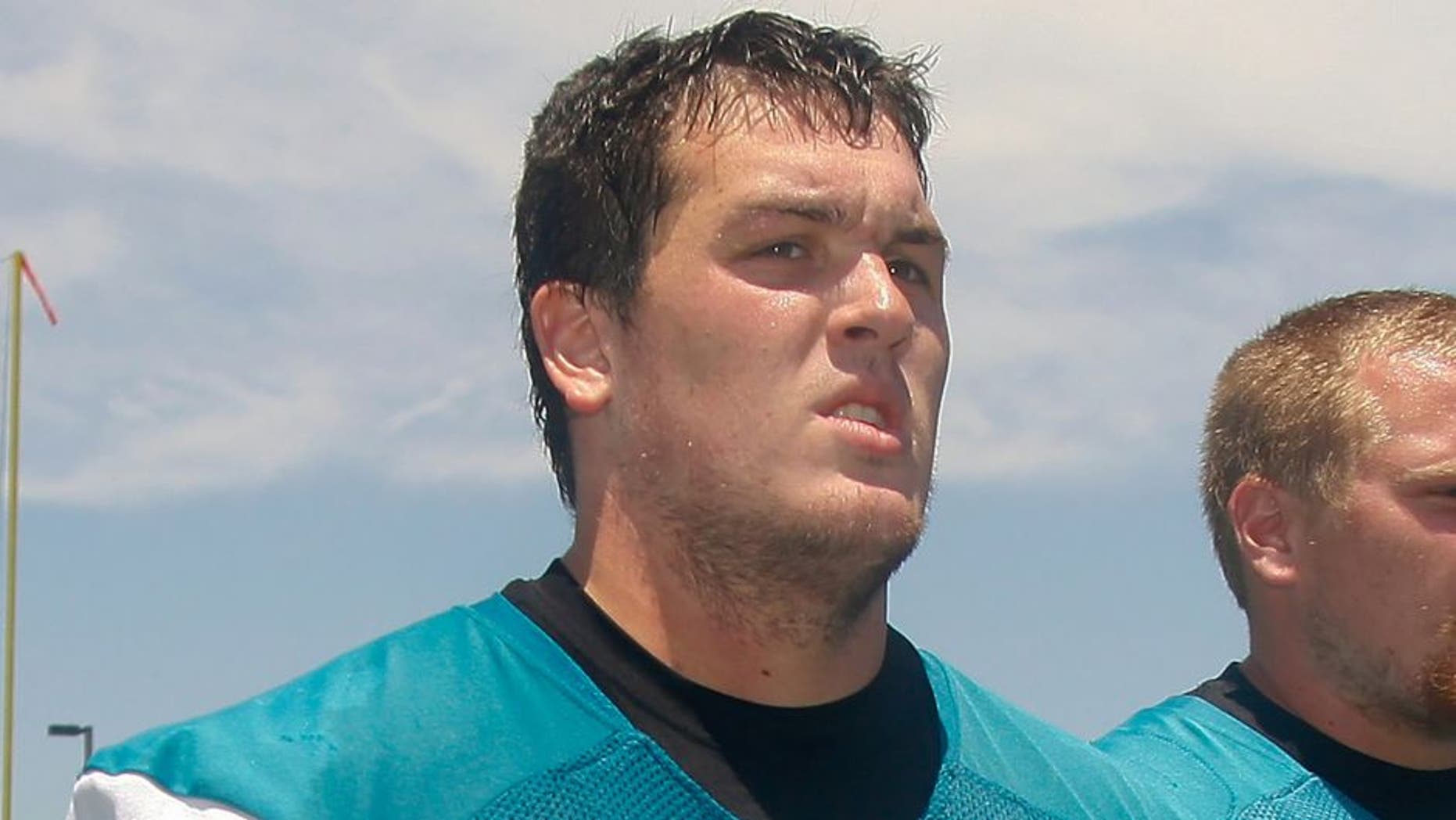 May 13, 2013; Jacksonville, FL, USA; Jacksonville Jaguars tackles R.J. Dill (74) and Jeff Nady (73) leave the field after organized team activities at The Florida Blue Health & Wellness Practice Fields. Mandatory Credit: Phil Sears-USA TODAY Sports