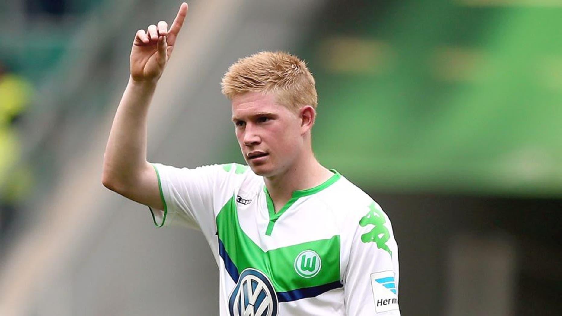 WOLFSBURG, GERMANY - AUGUST 16: Kevin De Bruyne of VfL Wolfsburg gestures after winning the Bundesliga match between VfL Wolfsburg and Eintracht Frankfurt at Volkswagen Arena on August 16, 2015 in Wolfsburg, Germany. (Photo by Martin Rose/Bongarts/Getty Images)