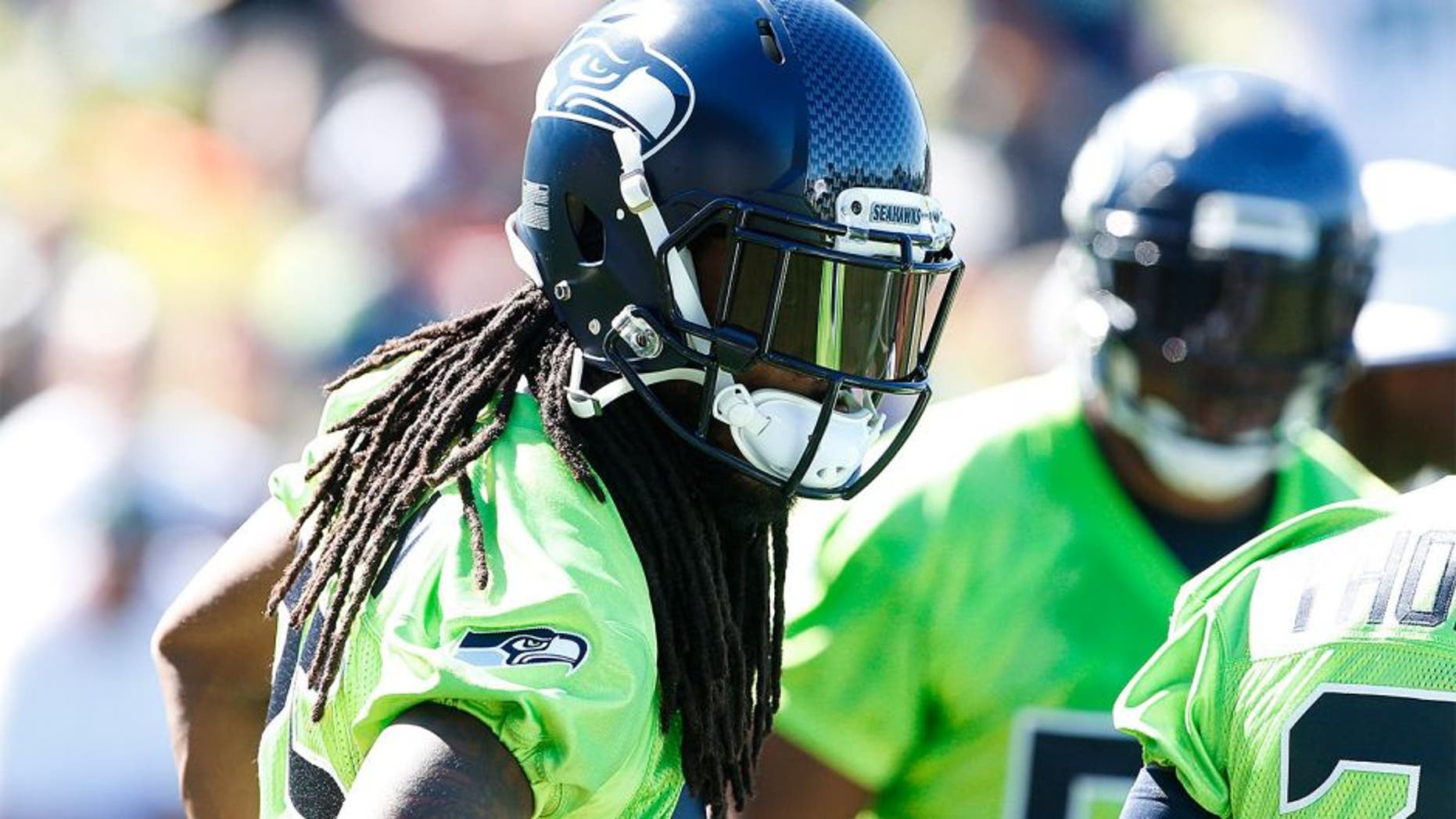Jul 31, 2015; Renton, WA, USA; Seattle Seahawks cornerback Richard Sherman (25) participates in a drill during training camp practice at Virginia Mason Athletic Center. Mandatory Credit: Joe Nicholson-USA TODAY Sports