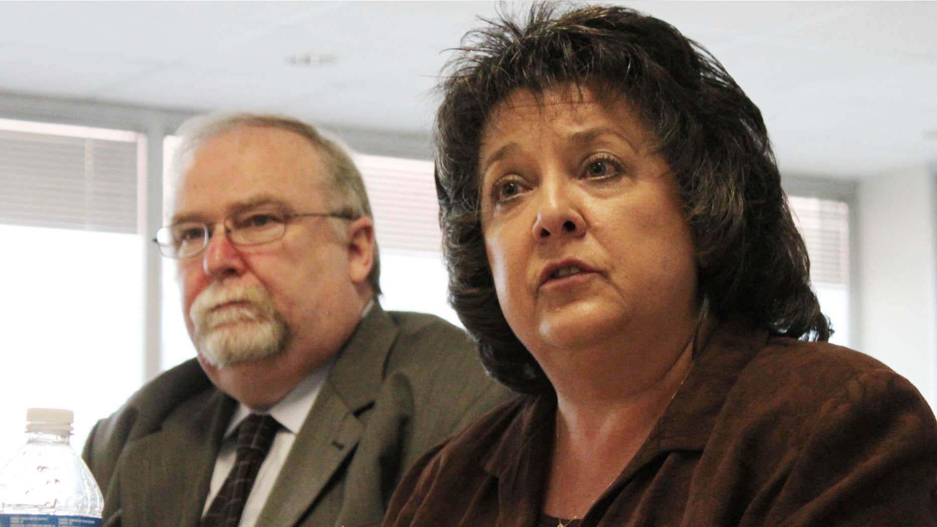July 16, 2011: Secretary of State Dianna Duran, right, talks about her office's efforts to ensure the accuracy of the state's voter registration rolls during an interim legislative committee hearing in Albuquerque, N.M.