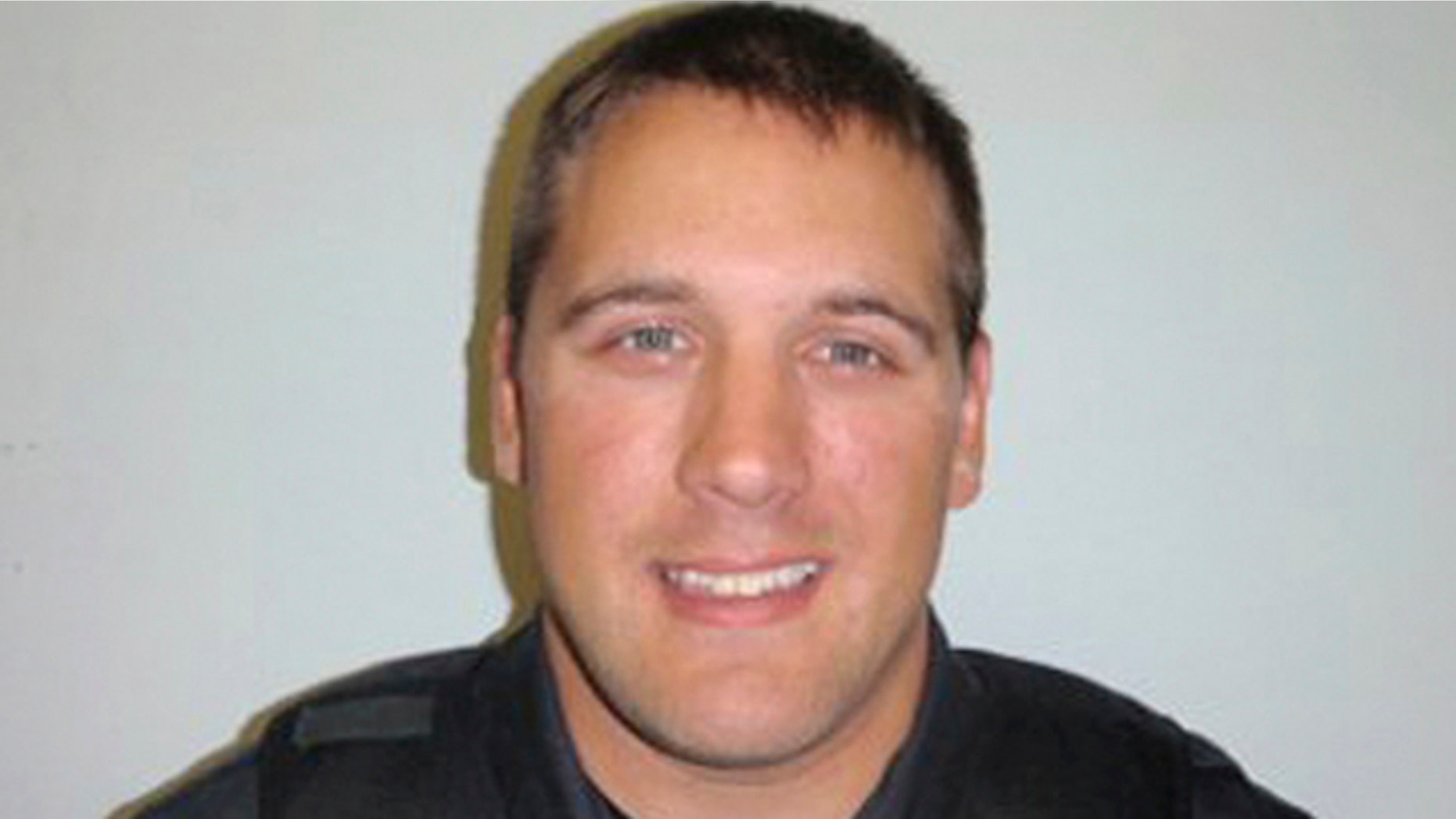 This undated photo provided by the Hoonah Police Dept. shows officer Tony Wallace.