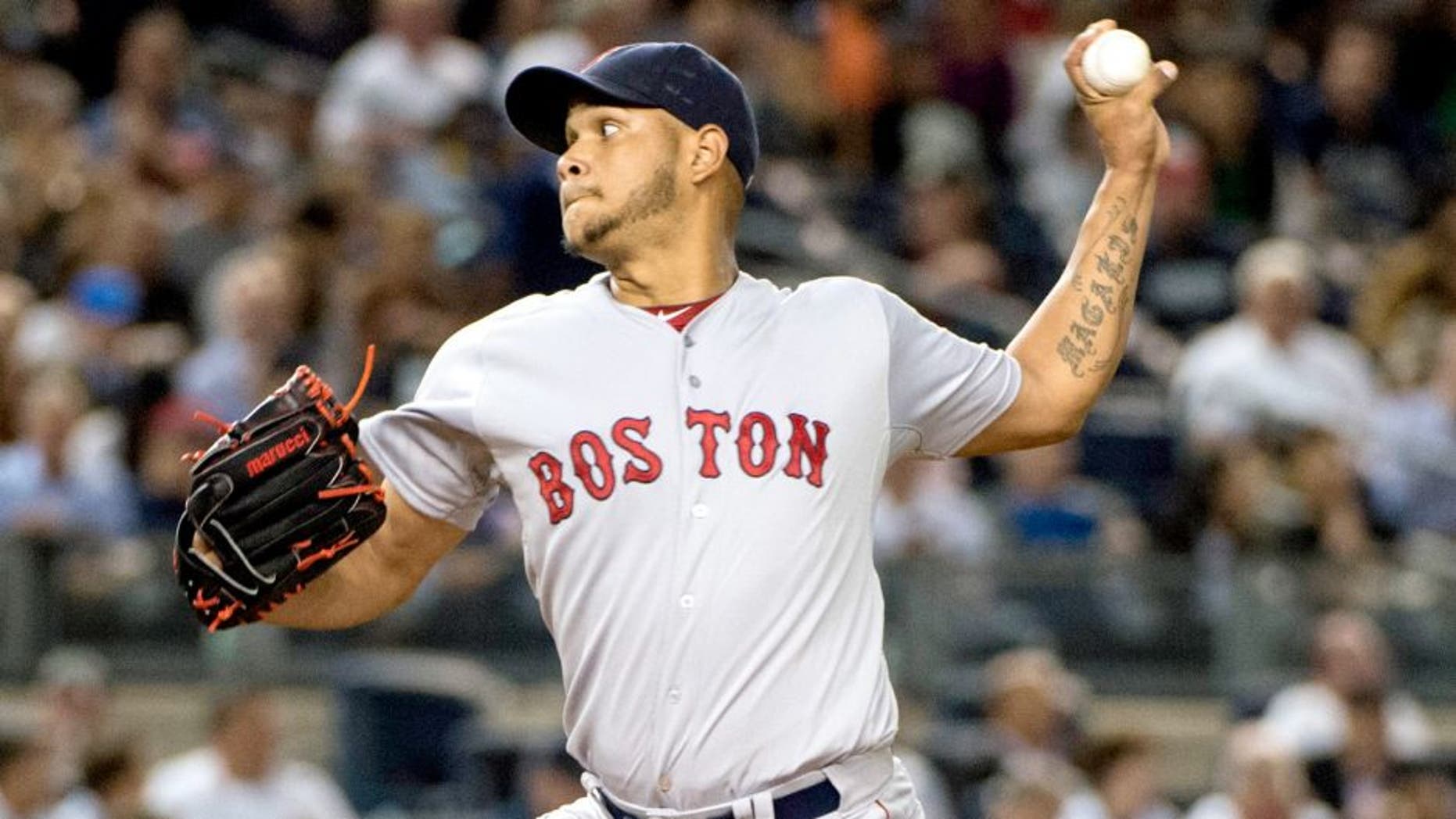Sep 28, 2015; Bronx, NY, USA; Boston Red Sox pitcher Eduardo Rodriguez (52) delivers a pitch during the second inning of the game against the New York Yankees at Yankee Stadium. Mandatory Credit: Gregory J. Fisher-USA TODAY Sports
