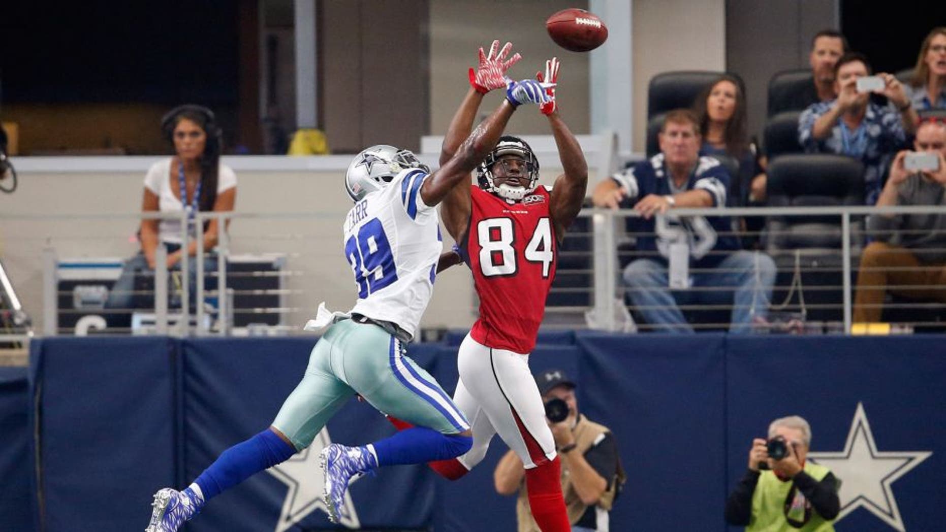 Sep 27, 2015; Arlington, TX, USA; Dallas Cowboys cornerback Brandon Carr (39) breaks up a pass in the end zone against Atlanta Falcons receiver Roddy White (84) in the first quarter at AT&T Stadium. Mandatory Credit: Matthew Emmons-USA TODAY Sports