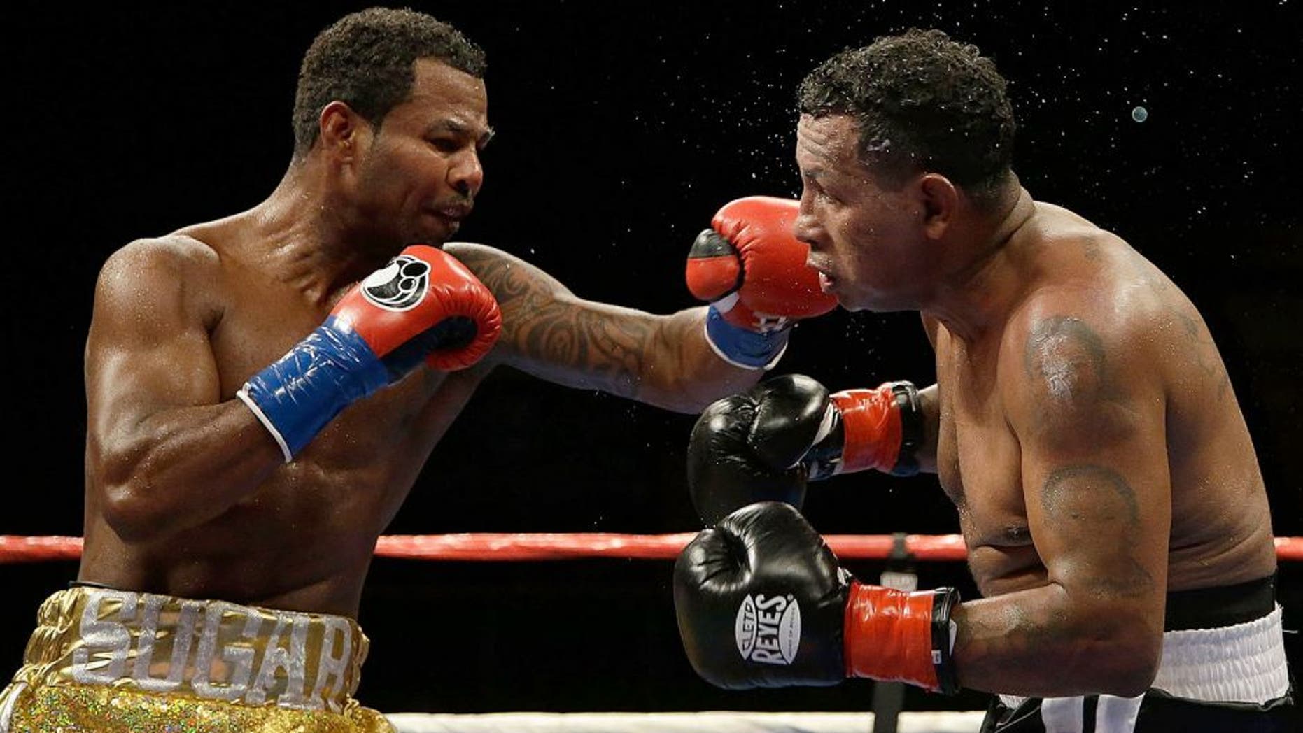 INGLEWOOD, CA - AUGUST 29: Shane Mosley lands a left hand to the head of Ricardo Mayorga of Nicaragua at The Forum on August 29, 2015 in Inglewood, California. (Photo by Jeff Gross/Getty Images)