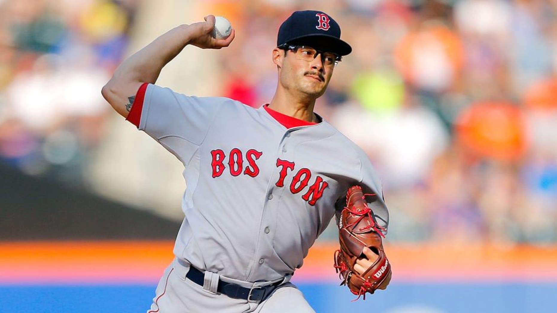 NEW YORK, NY - AUGUST 29: Joe Kelly #56 of the Boston Red Sox pitches in the third inning against the New York Mets at Citi Field on August 29, 2015 in the Flushing neighborhood of the Queens borough of New York City. (Photo by Jim McIsaac/Getty Images)
