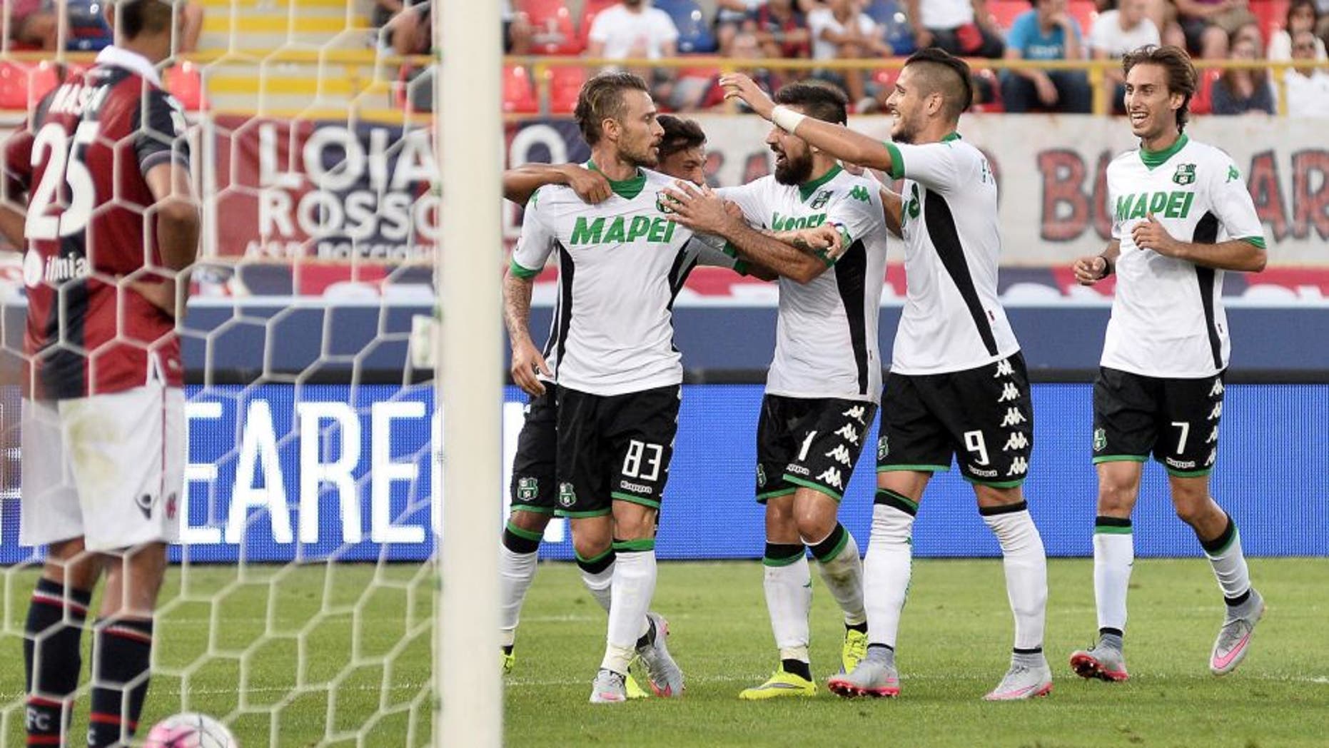 BOLOGNA, ITALY - AUGUST 29: Antonio Floro Flores # 83 of US Sassuolo Calcio celebrates with his teamates after scoring a goal during the Serie A match between Bologna FC and US Sassuolo Calcio at Stadio Renato Dall'Ara on August 29, 2015 in Bologna, Italy. (Photo by Mario Carlini / Iguana Press/Getty Images)