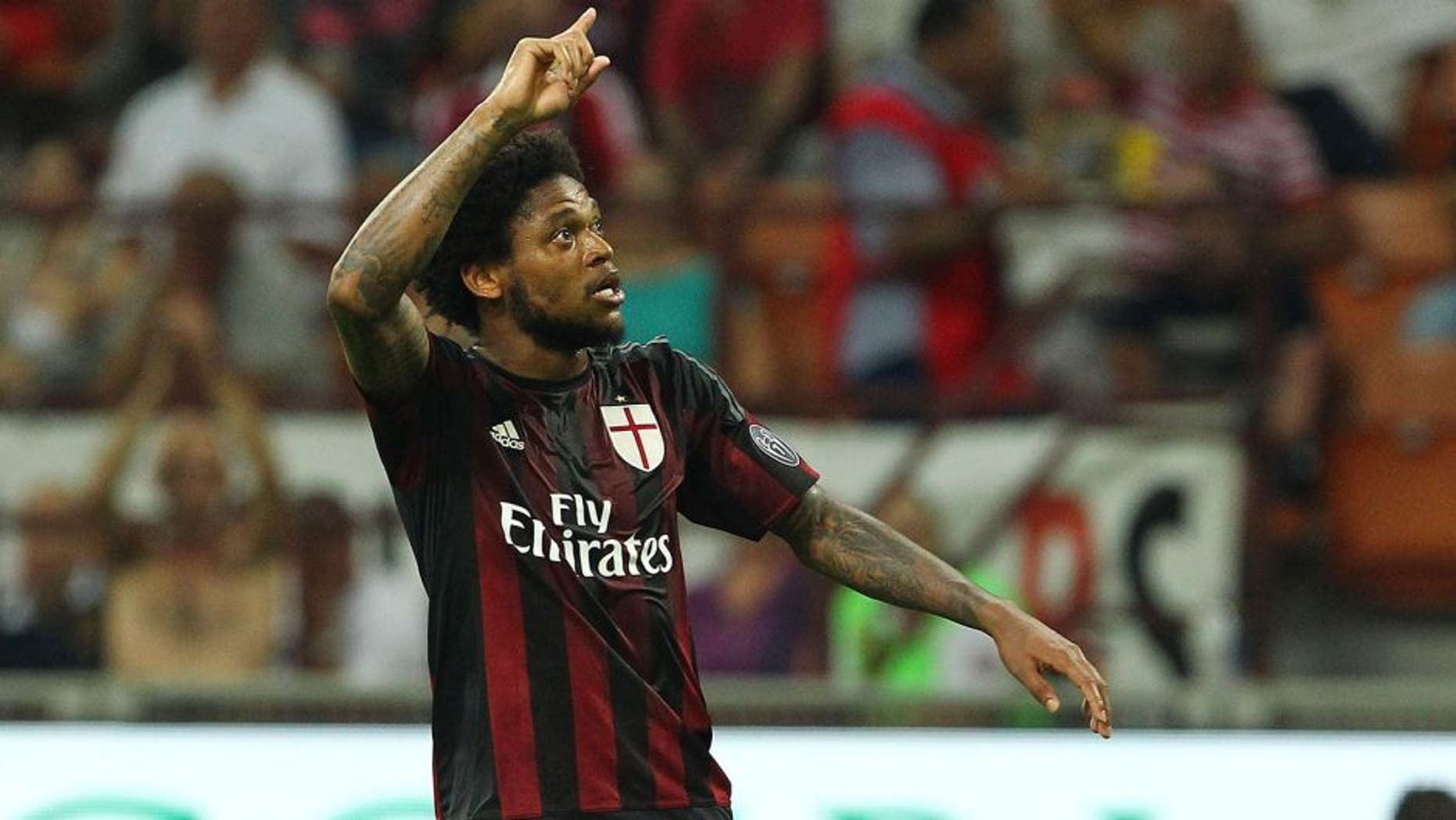 MILAN, ITALY - AUGUST 29: Luiz Adriano of AC Milan celebrates his goal during the Serie A match between AC Milan and Empoli FC at Stadio Giuseppe Meazza on August 29, 2015 in Milan, Italy. (Photo by Marco Luzzani/Getty Images)