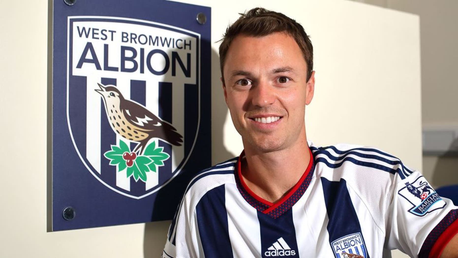 WALSALL, ENGLAND - AUGUST 28: West Bromwich Albion unveil new signing Jonny Evans from Manchester Untied at West Bromwich Albion Training Ground on August 28, 2015 in Walsall, England. (Photo by Matthew Ashton - AMA/Getty Images)