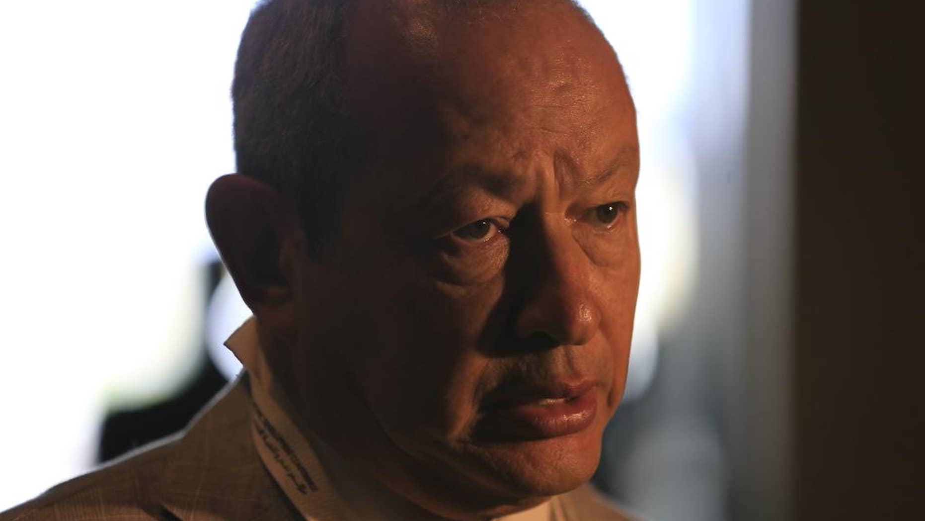 Egyptian billionaire businessman Naguib Sawiris speaks to journalists prior to the opening of a major economic conference seeking billions of dollars in investment, in Sharm el-Sheikh, Egypt, Friday, March 13, 2015. Egyptian President Abdel-Fattah el-Sissi approved a package of amendments to investment laws on Thursday, aimed at enticing foreign investors on the eve of the conference that will bring together hundreds of business executives and foreign leaders. (AP Photo/Hassan Ammar)