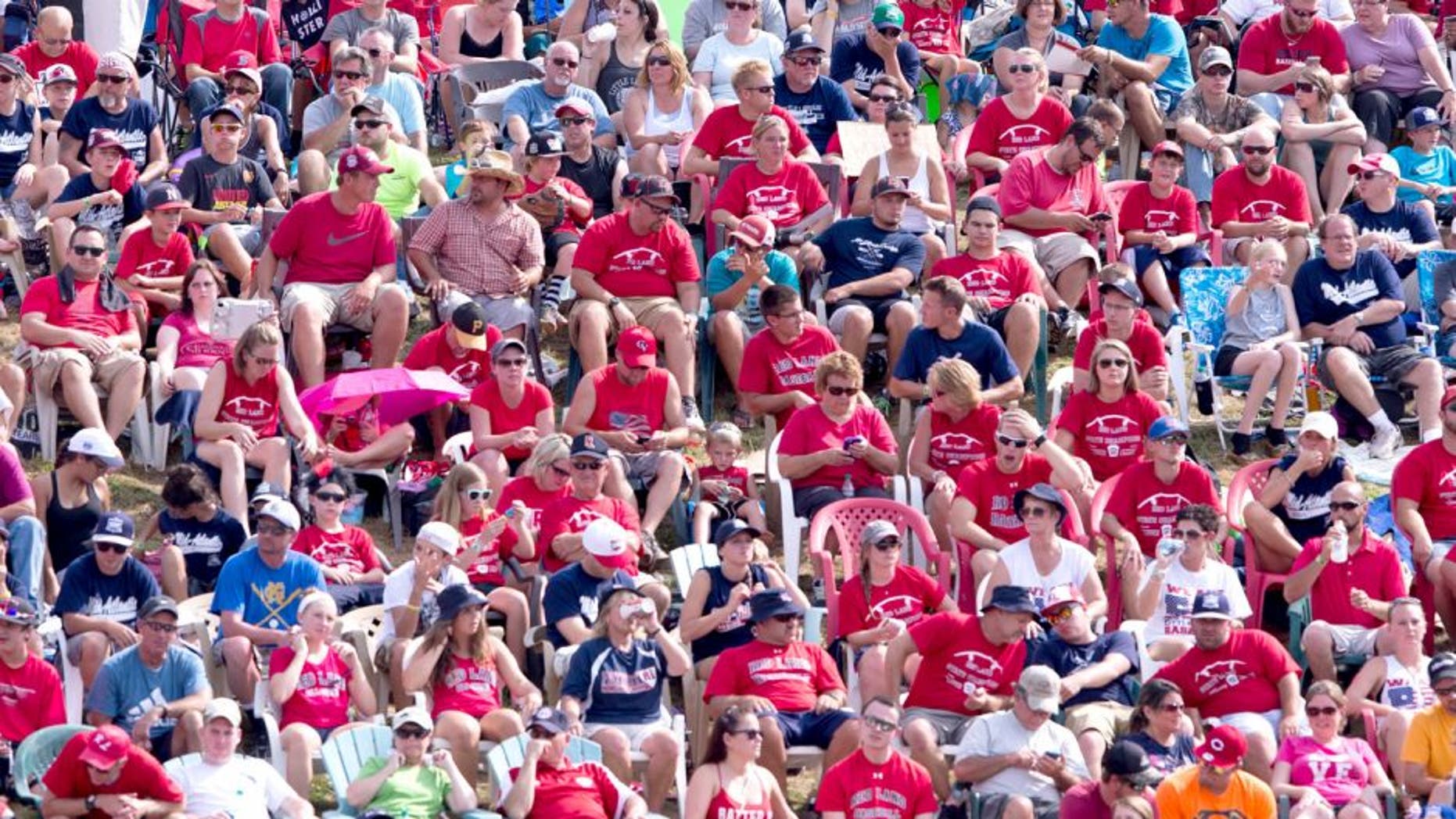 WILLIAMSPORT, PA - AUGUST 30: Fans are seen packed in on the hill in the outfield during the Little League World Series Championship Game between the Mid-Atlantic Team from Red Land Little League and team Japan from Tokyo Kitasuna Little League at Lamade Stadium during the Little League World Series on Sunday, August 30, 2015 in Williamsport, Pennsylvania. (Photo by Alex Trautwig/MLB Photos via Getty Images)