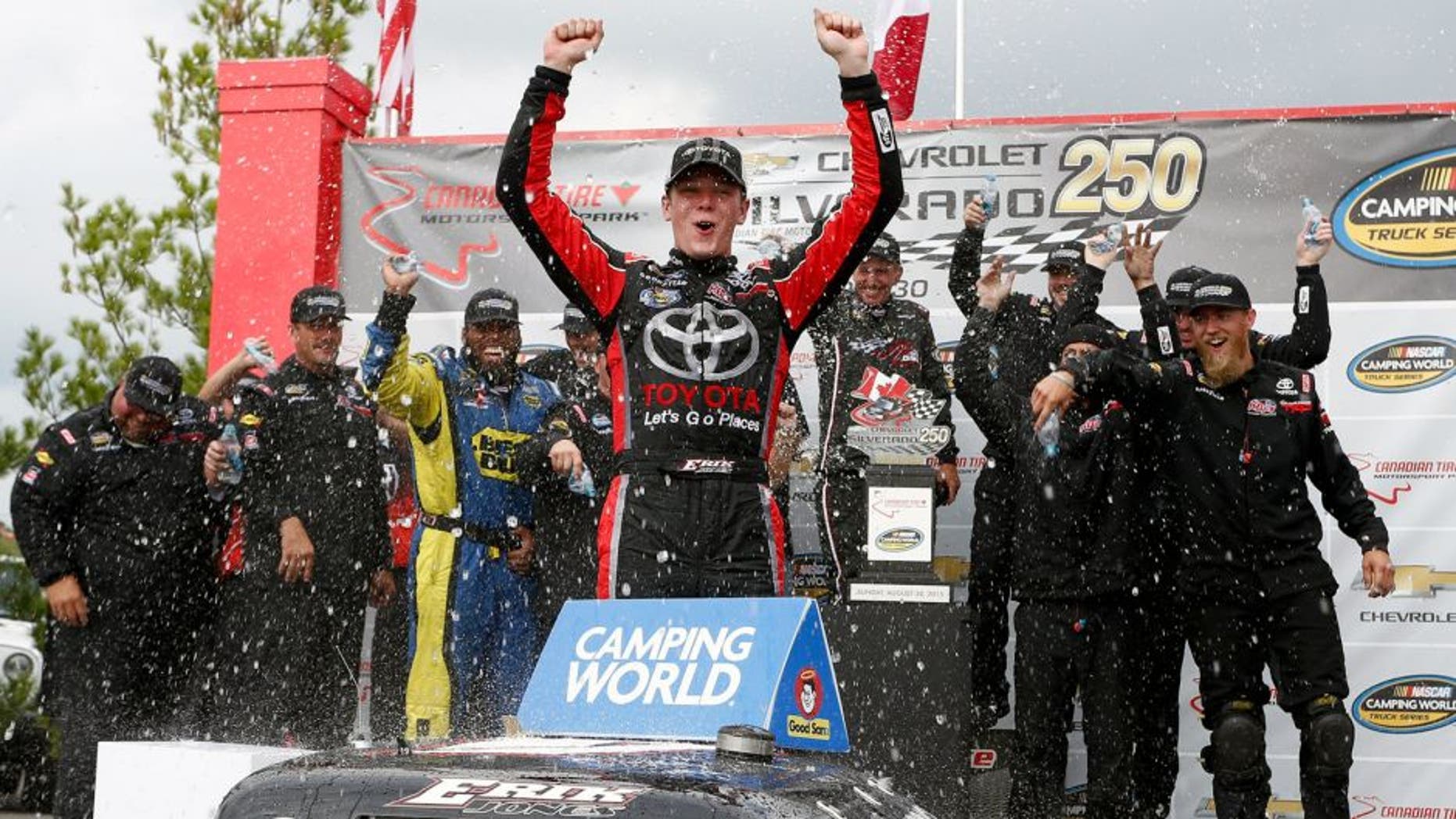 BOWMANVILLE, ON - AUGUST 30: Erik Jones, driver of the #4 Toyota Toyota, celebrates in victory lane after winning during the NASCAR Camping World Truck Series Chevrolet Silverado 250 at Canadian Tire Motorsport Park on August 30, 2015 in Bowmanville, Ontario, Canada. (Photo by Jeff Zelevansky/NASCAR via Getty Images)