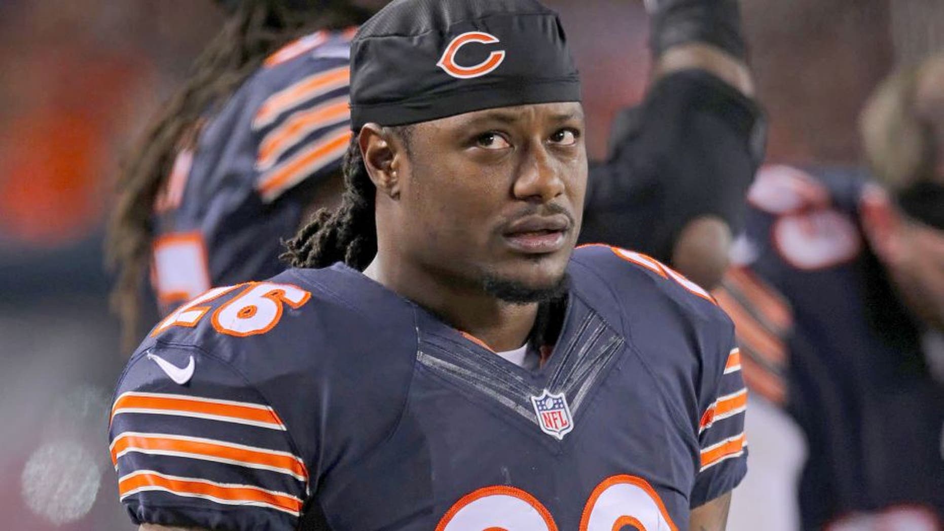 Dec 15, 2014; Chicago, IL, USA; Chicago Bears cornerback Tim Jennings (26) on the sideline during the second quarter against the New Orleans Saints at Soldier Field. Mandatory Credit: Dennis Wierzbicki-USA TODAY Sports