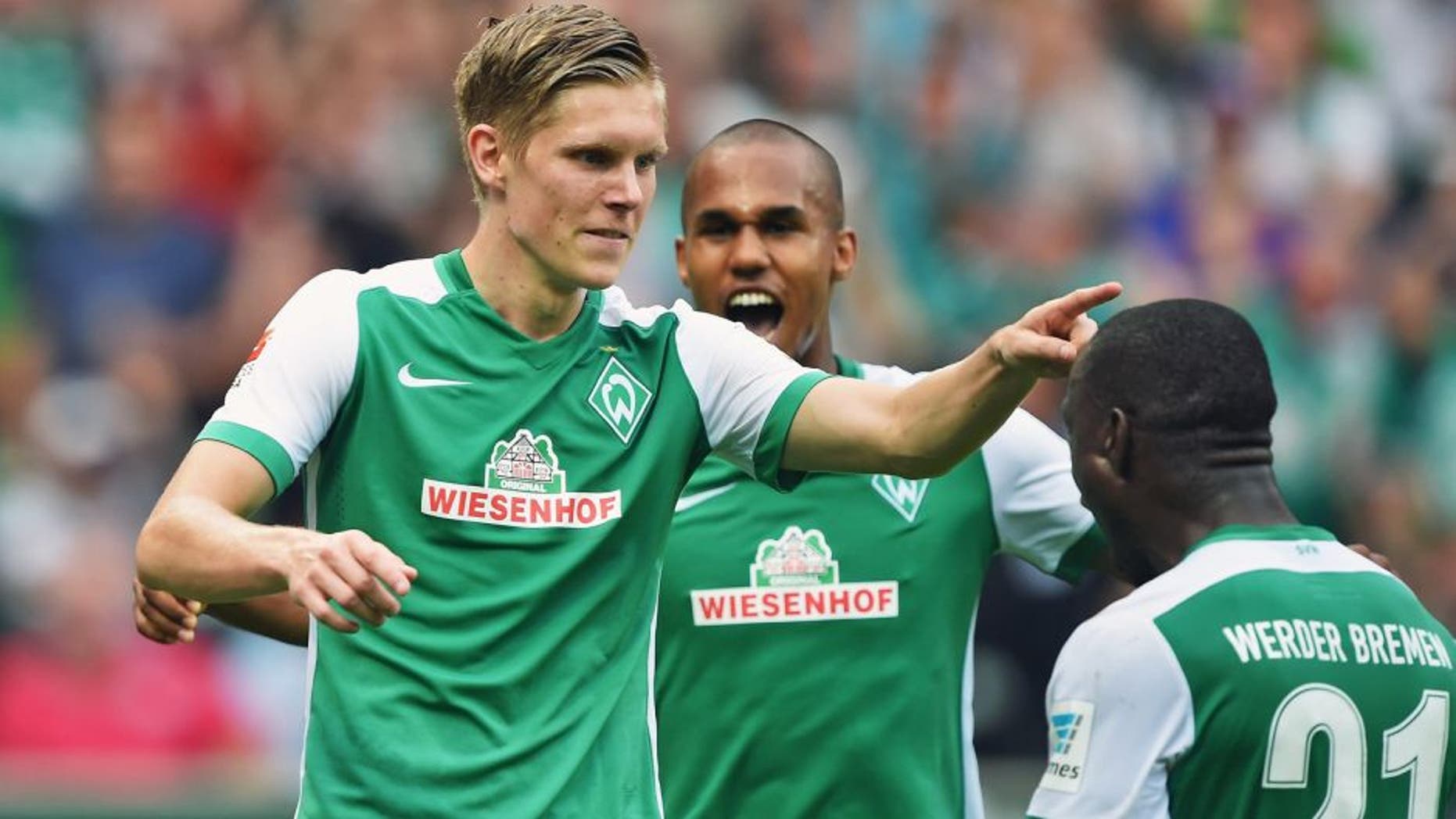 BREMEN, GERMANY - AUGUST 30: Aron Johansson of Bremen celebrates scoring his goal during the Bundesliga match between Werder Bremen and Borussia Moenchengladbach at Weserstadion on August 30, 2015 in Bremen, Germany. (Photo by Stuart Franklin/Bongarts/Getty Images)