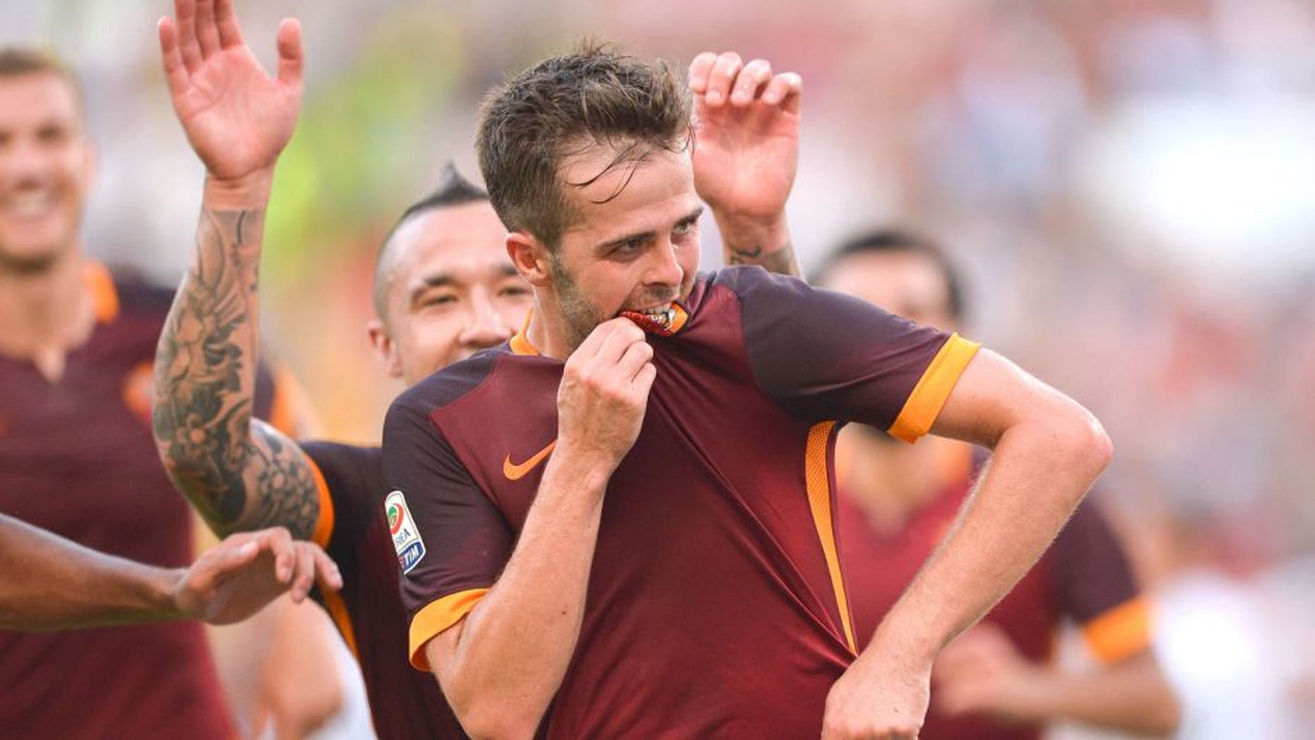 ROME, ITALY - AUGUST 30: AS Roma Player Miralem Pjanic celebrates the goal during the Serie A match between AS Roma and Juventus FC at Stadio Olimpico on August 30, 2015 in Rome, Italy. (Photo by Luciano Rossi/AS Roma via Getty Images)