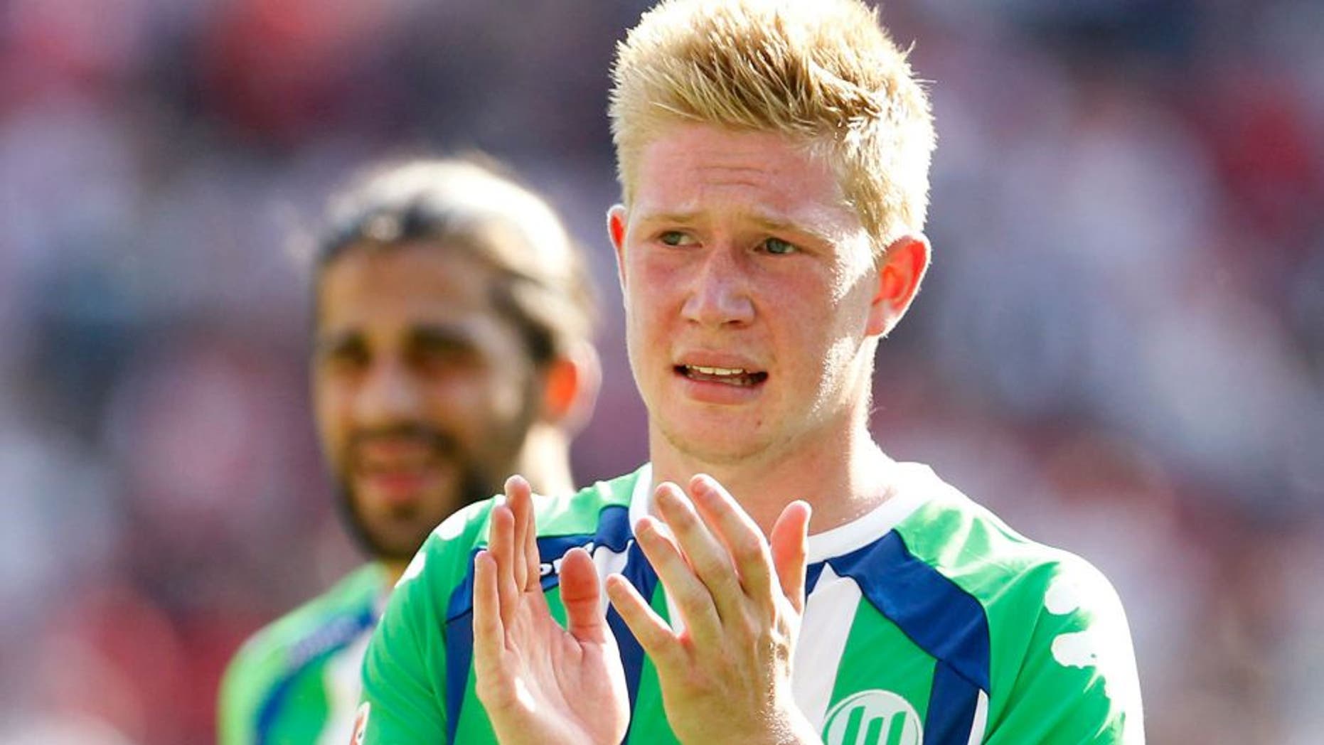 COLOGNE, GERMANY - AUGUST 22: Kevin De Bruyne of Wolfsburg claps after the Bundesliga match between 1. FC Koeln and VfL Wolfsburg at RheinEnergieStadion on August 22, 2015 in Cologne, Germany. (Photo by Mika Volkmann/Bongarts/Getty Images)