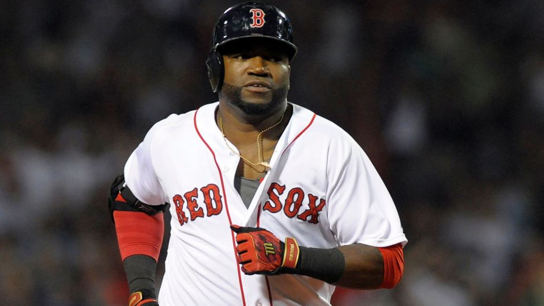Aug 31, 2015; Boston, MA, USA; Boston Red Sox designated hitter David Ortiz (34) rounds the bases after hitting a home run during the fourth inning against the New York Yankees at Fenway Park. Mandatory Credit: Bob DeChiara-USA TODAY Sports