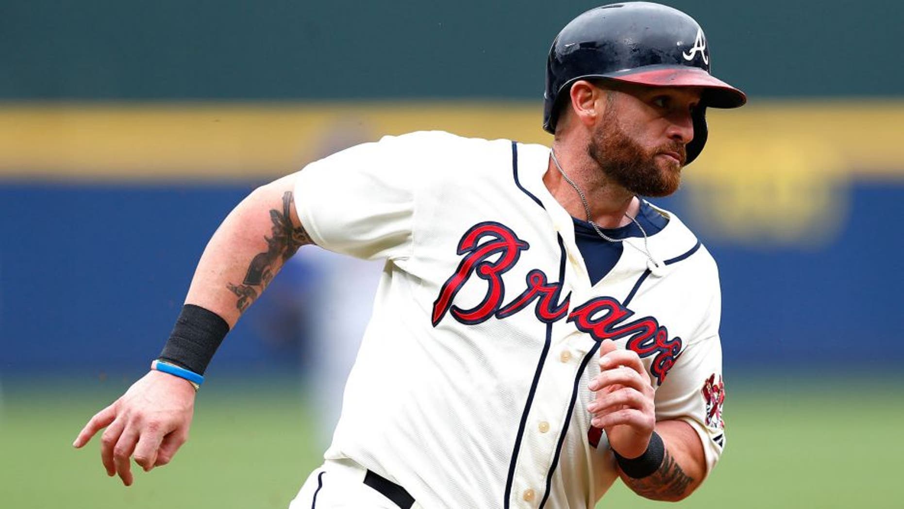 ATLANTA, GA - APRIL 12: Jonny Gomes #7 of the Atlanta Braves in action against the New York Mets during the Braves opening series at Turner Field on April 12, 2015 in Atlanta, Georgia. (Photo by Kevin C. Cox/Getty Images)