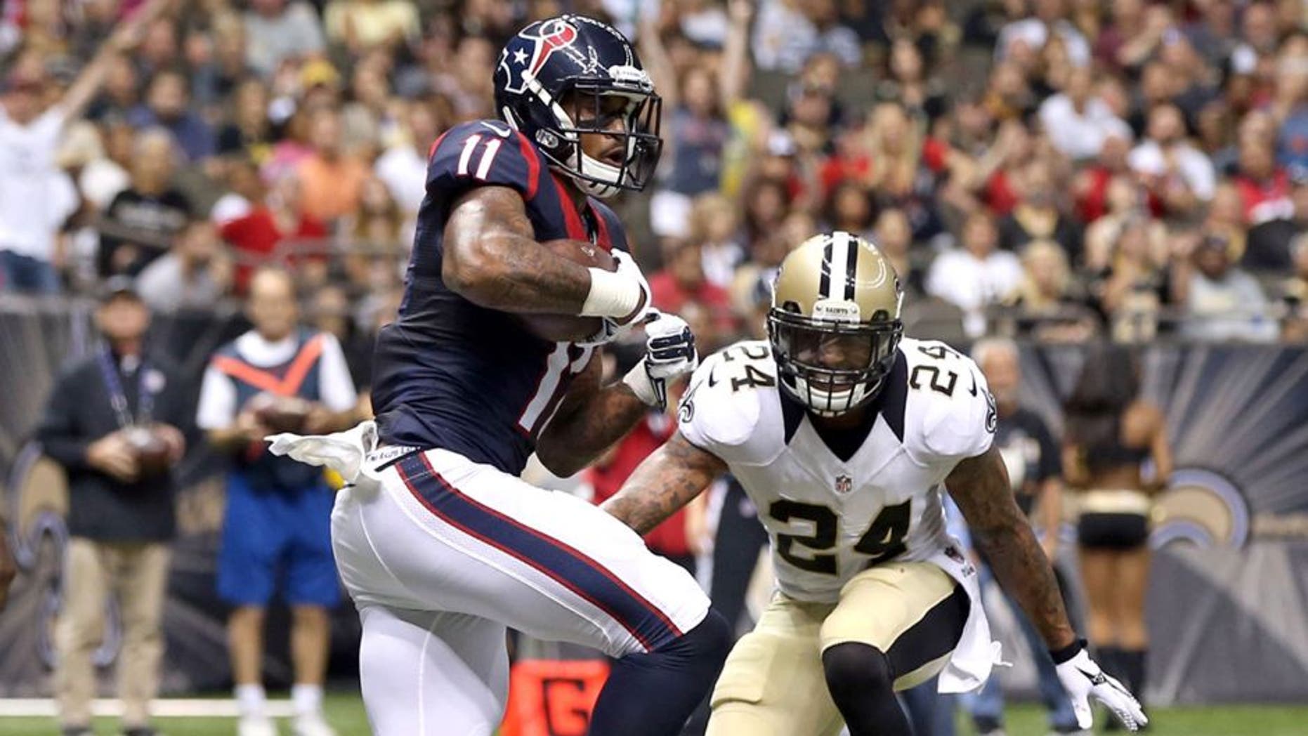 Aug 30, 2015; New Orleans, LA, USA; Houston Texans wide receiver Jaelen Strong (11) scores a touchdown in the second half of their game against the New Orleans Saints at the Mercedes-Benz Superdome. The Texans won, 27-13. Mandatory Credit: Chuck Cook-USA TODAY Sports