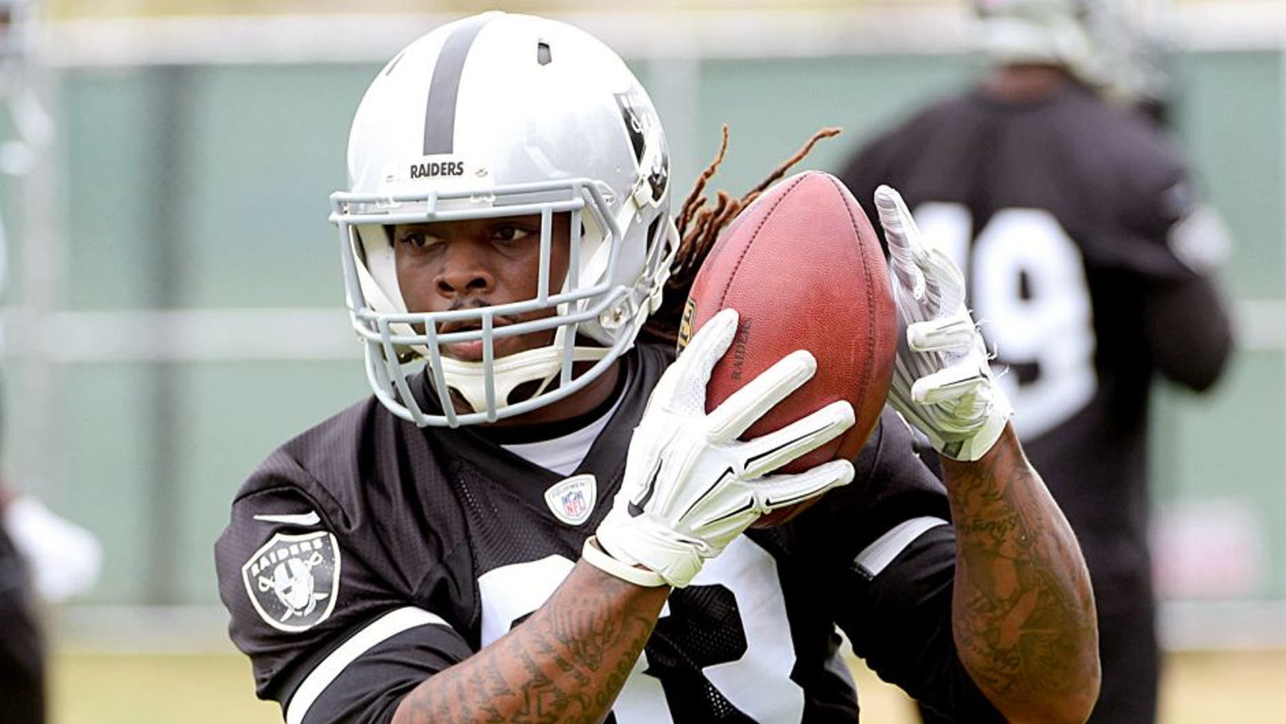 May 26, 2015; Alameda, CA, USA; Oakland Raiders running back Trent Richardson (33) catches a pass at organized team activities at the Raiders practice facility. Mandatory Credit: Kirby Lee-USA TODAY Sports
