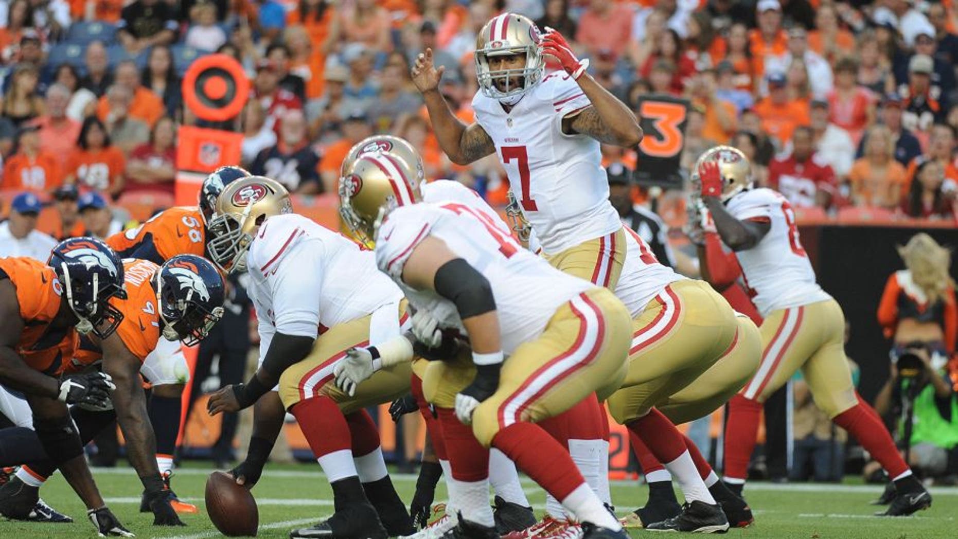 DENVER, CO - AUGUST 29: San Francisco 49ers quarterback Colin Kaepernick in the first half against the Denver Broncos at Sports Authority Field at Mile High on Saturday, August 29, 2015. (Photo by Steve Nehf/The Denver Post via Getty Images)
