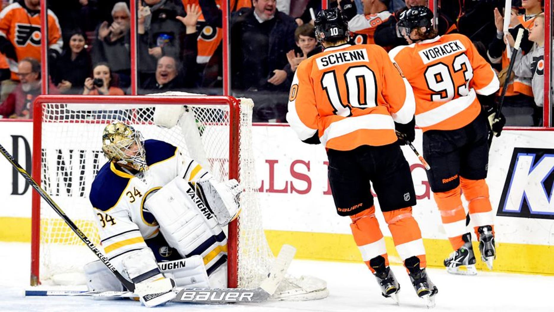 Feb 19, 2015; Philadelphia, PA, USA; Philadelphia Flyers right wing Jakub Voracek (93) celebrates his goal against Buffalo Sabres goalie Michal Neuvirth (34) during the second period at Wells Fargo Center. Mandatory Credit: Eric Hartline-USA TODAY Sports