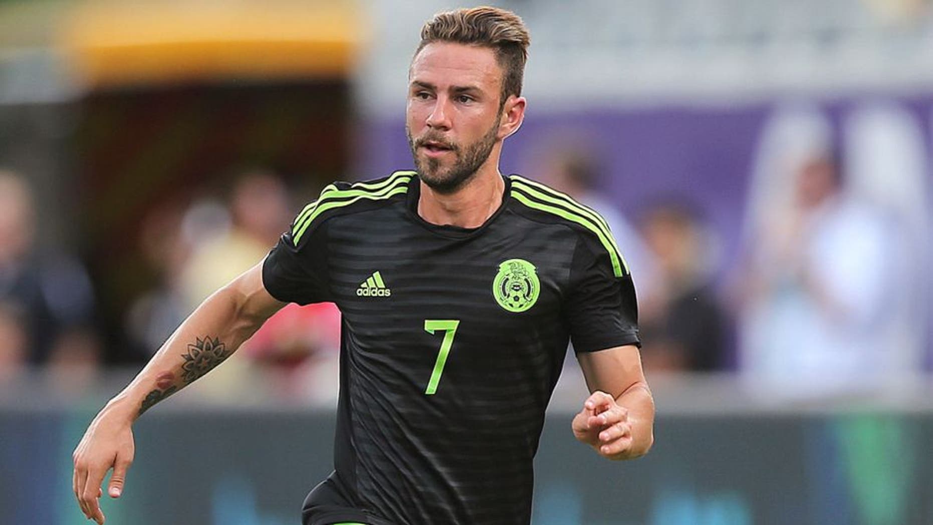 ORLANDO, FL - JUNE 27: Miguel Layun #7 of Mexico dribbles the ball during an international friendly soccer match between Mexico and Costa Rica at the Orlando Citrus Bowl on June 27, 2015 in Orlando, Florida. The game ended in a 2-2 draw. (Photo by Alex Menendez/Getty Images)
