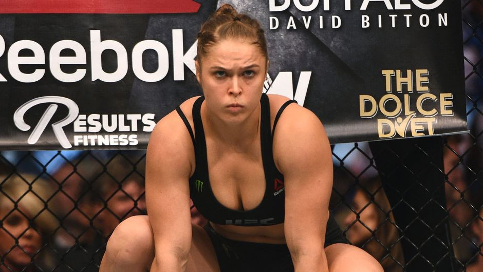 LOS ANGELES, CA - FEBRUARY 28: Ronda Rousey enters the Octagon in her UFC women's bantamweight championship bout against Cat Zingano during the UFC 184 event at Staples Center on February 28, 2015 in Los Angeles, California. (Photo by Jeff Bottari/Zuffa LLC/Zuffa LLC via Getty Images)