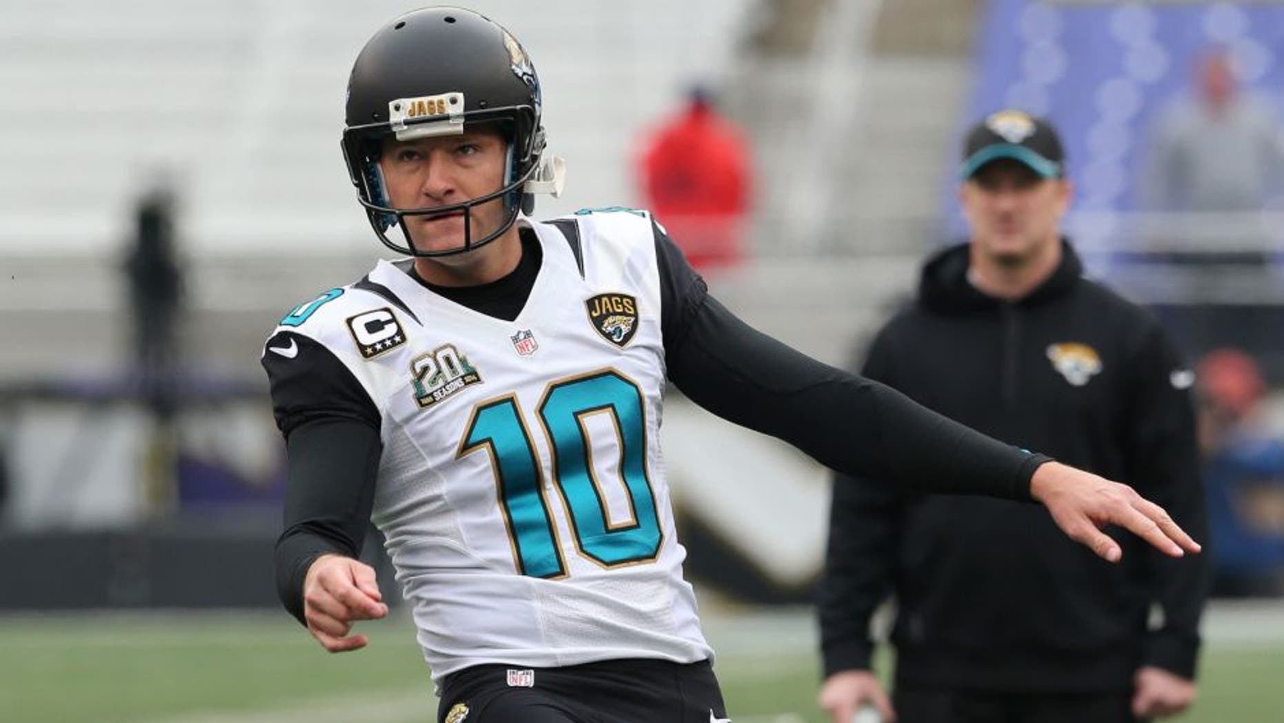 Dec 14, 2014; Baltimore, MD, USA; Jacksonville Jaguars kicker Josh Scobee (10) warms up prior to the game against the Baltimore Ravens at M&T Bank Stadium. Mandatory Credit: Mitch Stringer-USA TODAY Sports