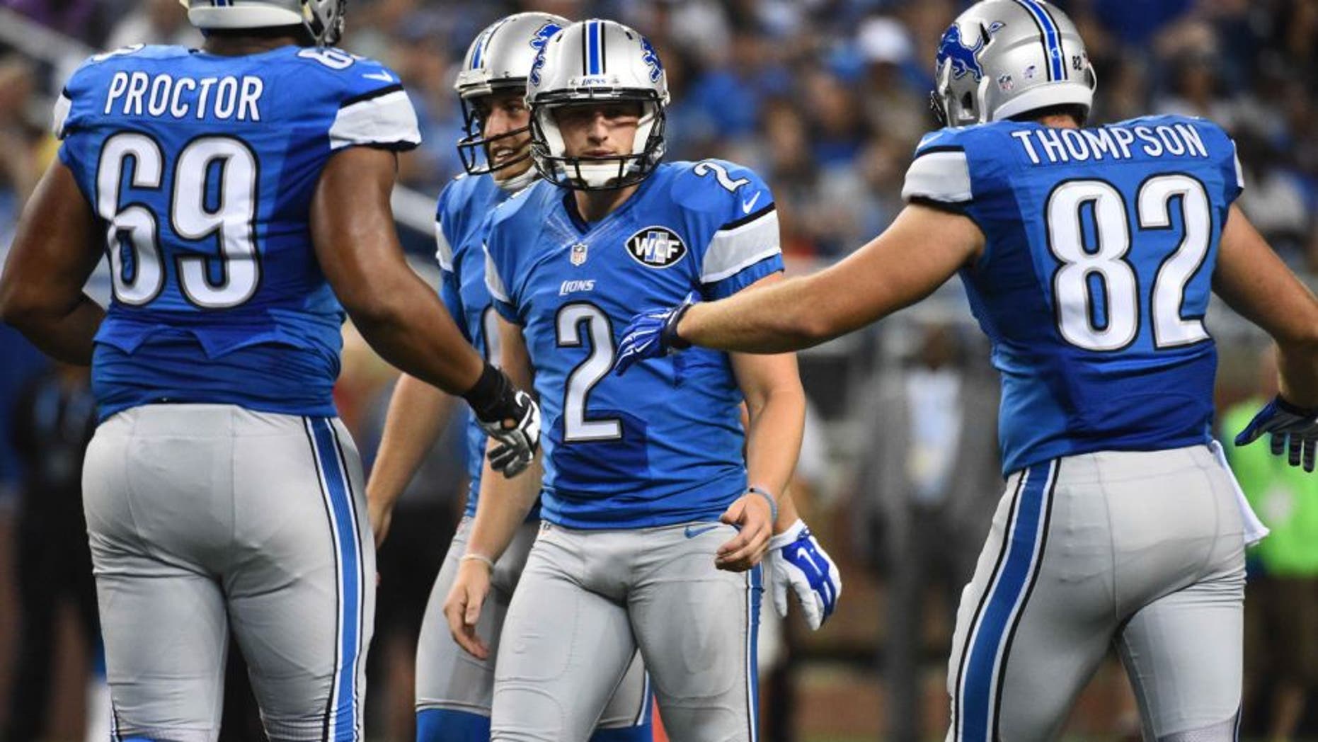 Aug 13, 2015; Detroit, MI, USA; Detroit Lions kicker Kyle Brindza (2) is congratulated by teammates after a field goal during the third quarter against the New York Jets in a preseason NFL football game at Ford Field. Mandatory Credit: Tim Fuller-USA TODAY Sports