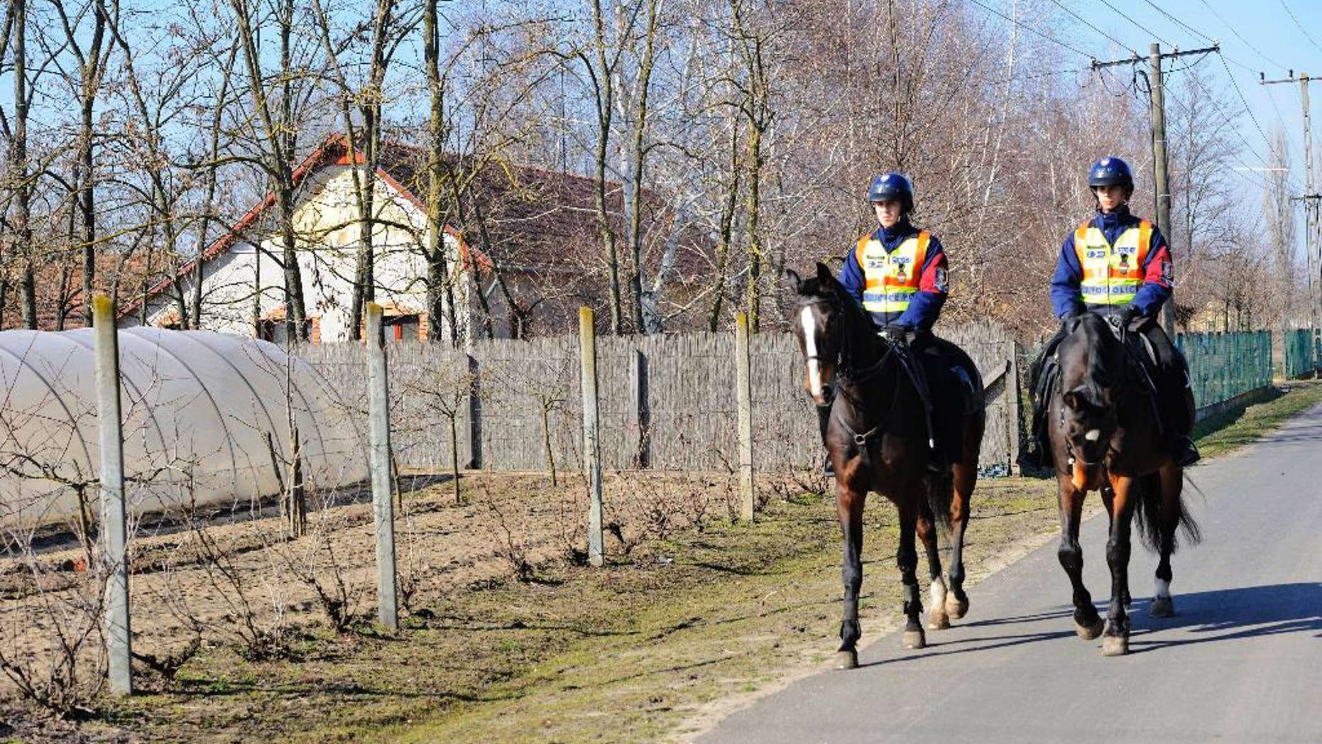 Feb. 13, 2015: Mounted police officers patrol in the vicinity of Morahalom, southeast of Budapest, Hungary, next to the Serbian border.