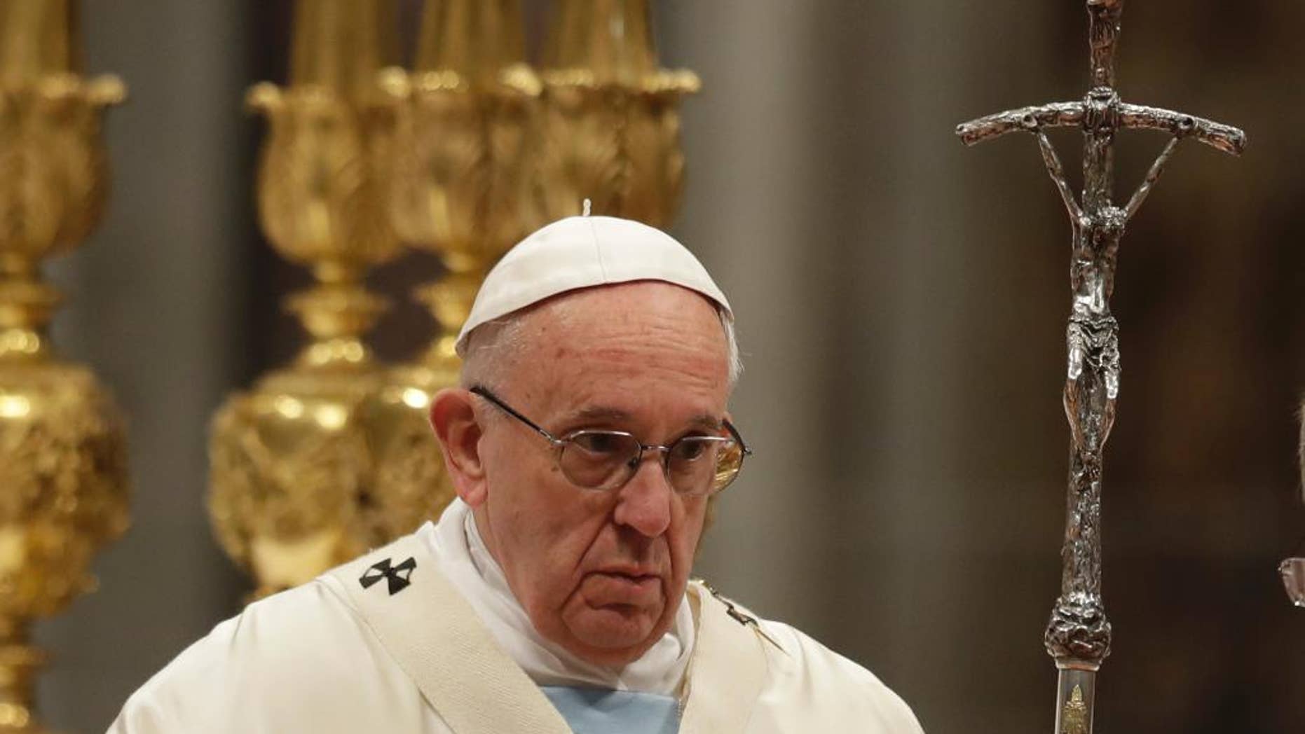 Pope Francis celebrates a new year's Mass in St. Peter's Basilica at the Vatican, Sunday, Jan. 1, 2017. (AP Photo/Andrew Medichini)