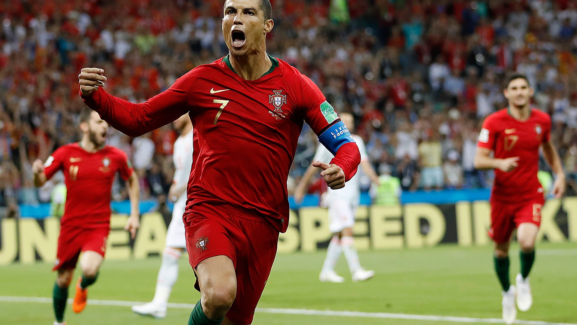 Portugal's Cristiano Ronaldo celebrates his side's opening goal during the group B match between Portugal and Spain at the 2018 soccer World Cup in Sochi, Russia, Friday, June 15, 2018. (AP Photo/Francisco Seco)