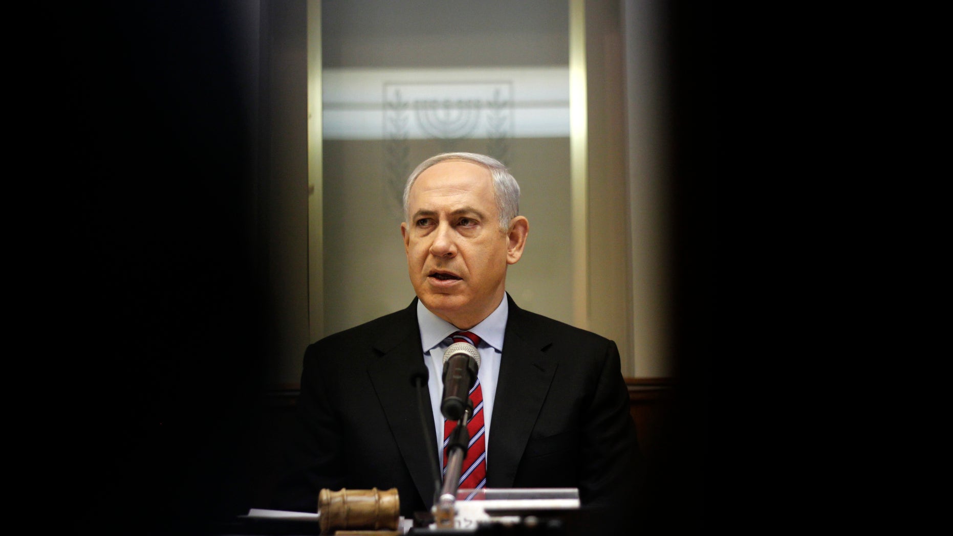 Israeli Prime Minister Benjamin Netanyahu heads the weekly Cabinet meeting at his Jerusalem office, Sunday, Jan. 27, 2013. (AP Photo/Ariel Schalit)
