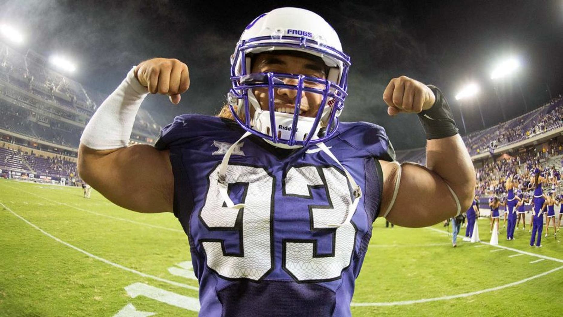 Aug 30, 2014; Fort Worth, TX, USA; TCU Horned Frogs defensive end Mike Tuaua (93) poses for a photo after the game against the Samford Bulldogs at Amon G. Carter Stadium. Tuaua has two sacks and forces two fumbles. The Horned Frogs defeated the Bulldogs 48-14. Mandatory Credit: Jerome Miron-USA TODAY Sports