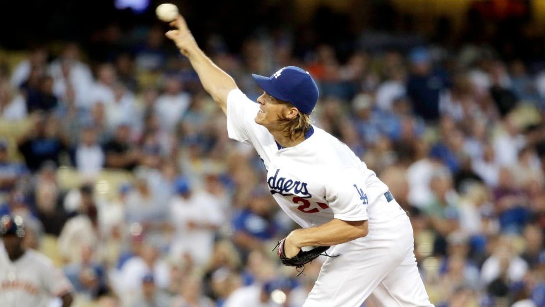 Los Angeles Dodgers starting pitcher Zack Greinke throws to the San Francisco Giants during the first inning of a baseball game in Los Angeles, Tuesday, Sept. 1, 2015. (AP Photo/Chris Carlson)