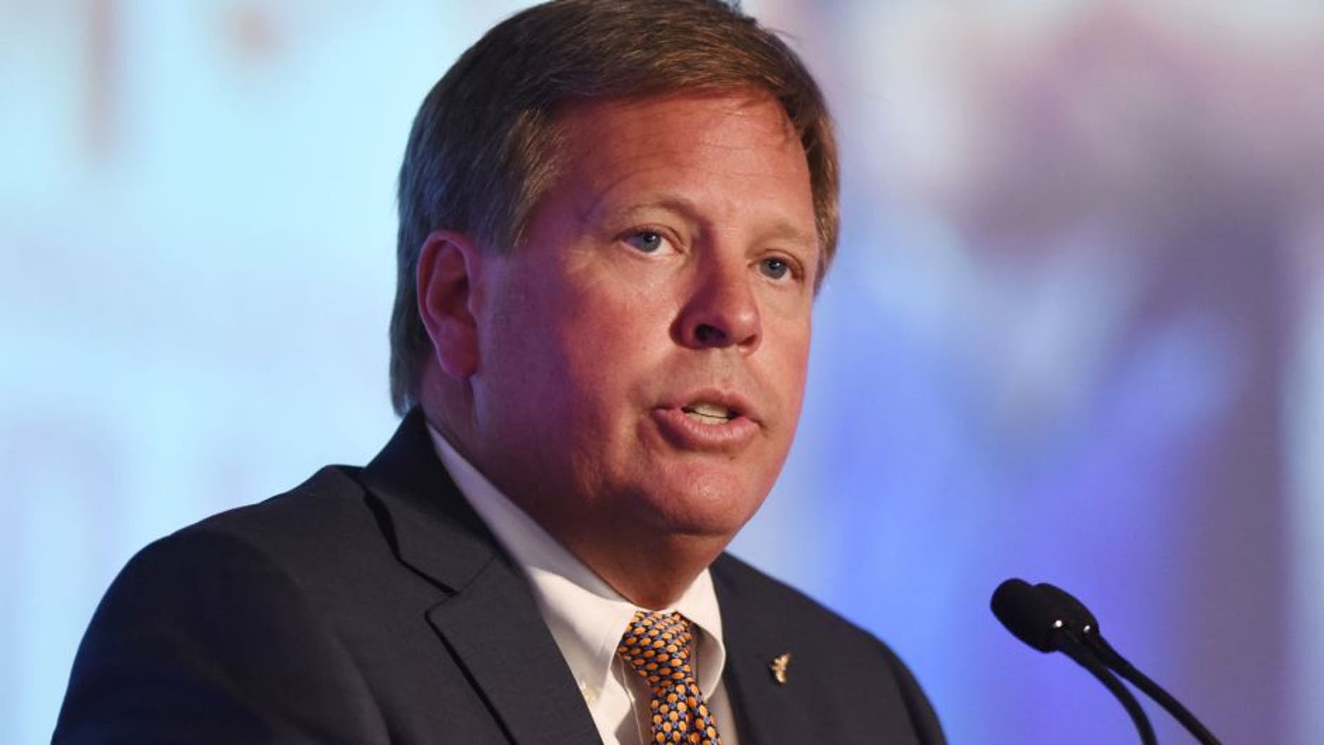 Jul 13, 2015; Hoover, AL, USA; Florida Gators football coach Jim McElwain fields questions during SEC media days at the Wynfrey Hotel. Mandatory Credit: Kelly Lambert-USA TODAY Sports