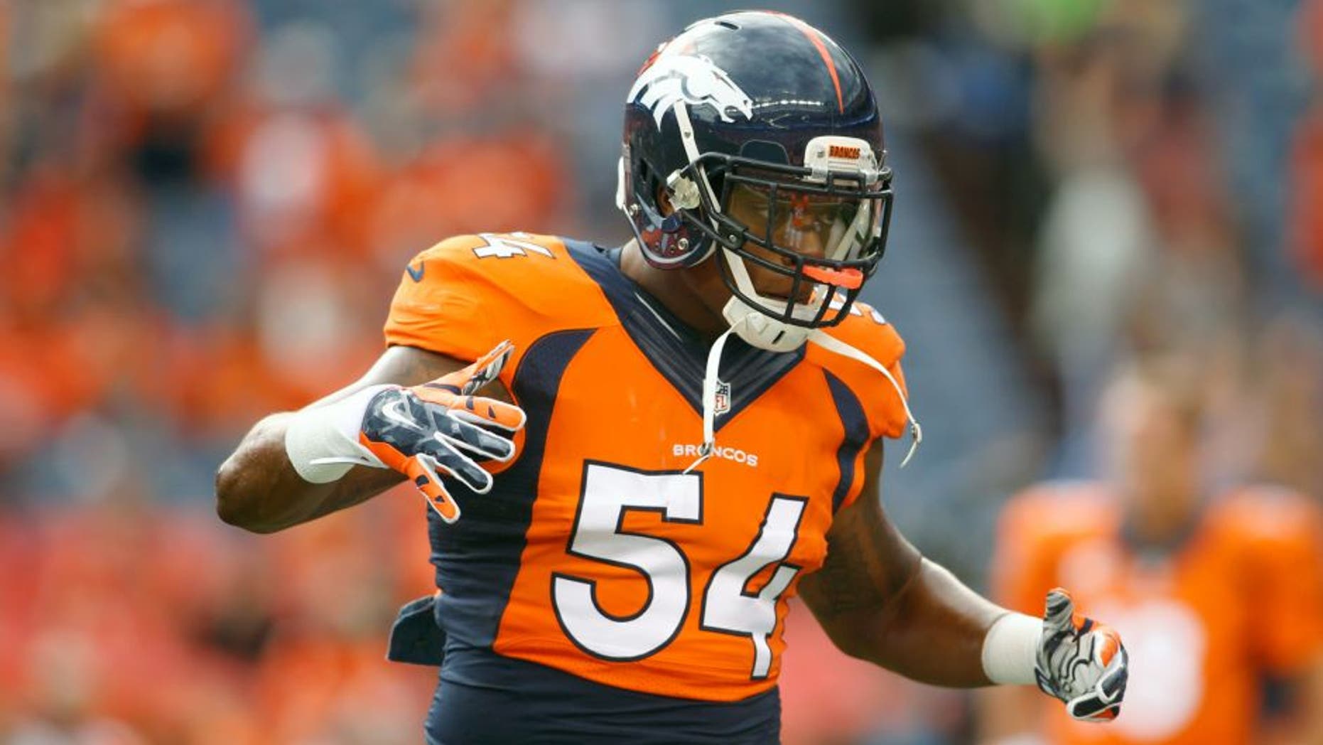 Sep 7, 2014; Denver, CO, USA; Denver Broncos linebacker Brandon Marshall (54) before the game against the Indianapolis Colts at Sports Authority Field at Mile High. Mandatory Credit: Chris Humphreys-USA TODAY Sports